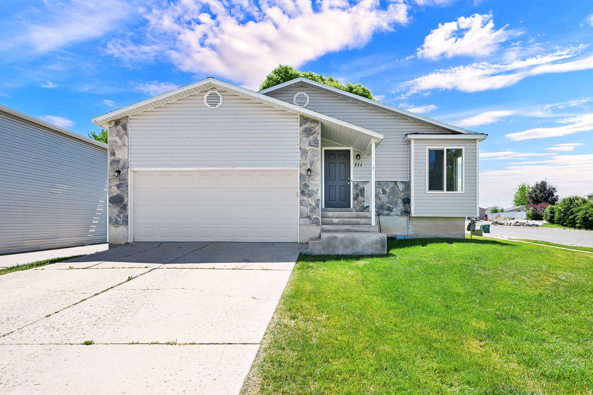 Welcome to 711 S 825 E in Layton, Utah, a beautifully refreshed home in one of Davis County's most convenient and sought-after locations! Featuring 5 bedrooms, 2 bathrooms, and fresh updates throughout, this home is move-in ready and packed with value. You'll love the brand-new carpet and fresh paint that give the entire home a clean, modern feel while still offering warmth and comfort the moment you walk in. Brand new roof was put in Fall 2025 and there is a hookup for water softener. Step outside and enjoy the spacious backyard, perfect for entertaining, BBQs, summer evenings, pets, gardening, or simply relaxing with family and friends. Whether you're hosting gatherings or enjoying quiet nights under the Utah sky, this backyard offers the space and flexibility today's buyers are looking for. Located in a highly desirable Layton neighborhood, this home offers quick access to shopping, dining, parks, schools, I 15, and is just minutes from Hill Air Force Base, making it an excellent option for military families, commuters, and anyone looking for convenience along the Wasatch Front. With easy access to Salt Lake City, Ogden, and outdoor recreation, this location truly checks all the boxes. If you've been searching for a clean, updated home with room to grow in Layton, Utah near Hill AFB, this is one you won't want to miss! Square footage figures are provided as a courtesy estimate only and were obtained from county records. Buyer is advised to obtain an independent measurement.