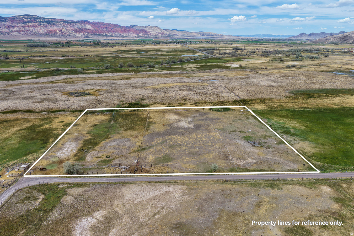 Located just west of Glenwood on approximately 200 N and 1000 W, this 5-acre parcel offers an excellent opportunity for pasture use, hobby farm, or building lot, all while being conveniently close to town. The property features 0.045 CFS of underground water, delivered via a free-flowing well as reported by the Division of Water Rights.  With open space and scenic surroundings, this parcel also presents potential as a future building lot. A percolation (perk) test has been completed by the sellers, supporting building options.  Whether you're looking to expand agricultural use, establish a small farm, or explore the possibility of building a home with room to grow, this property provides versatility and value in a desirable rural setting.