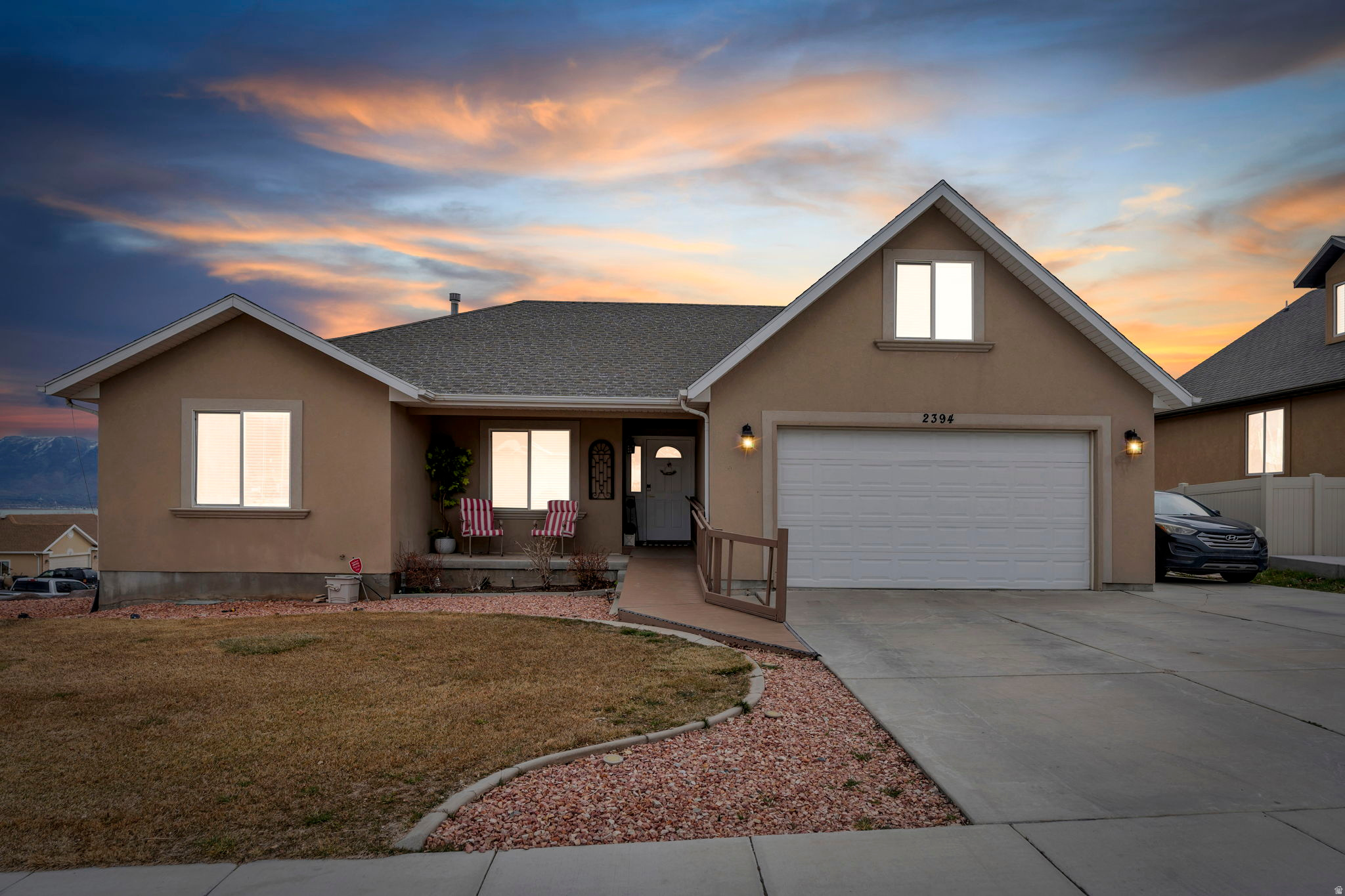 Recently adjusted to $613,900. Super clean rambler in the heart of Jacobs Ranch offering MAIN-LEVEL LIVING, a highly functional layout, and a FINISHED WALKOUT BASEMENT WITH SEPARATE ENTRANCE. The main level features a spacious primary suite, ramp access at the front entry, vaulted ceilings, an open-concept living area, granite countertops, newer appliances, and a cozy gas fireplace. The finished basement adds excellent flexibility with additional bedrooms, family room space, cold storage, and a walkout entrance. Great setup for multi-generational living, extra living space, or flexible use. Enjoy a large deck overlooking beautiful mountain and lake views, plus an outdoor kitchen area that is great for entertaining. The backyard has room to expand and customize for additional outdoor use. Located on a corner lot with RV parking, gazebo, storage shed, and no HOA. Convenient location near Redwood Road, Mountain View Corridor, Pioneer Crossing, Costco, Smith's, schools, restaurants, and shopping. Some furniture may be available for purchase separately. Buyer to verify all information.