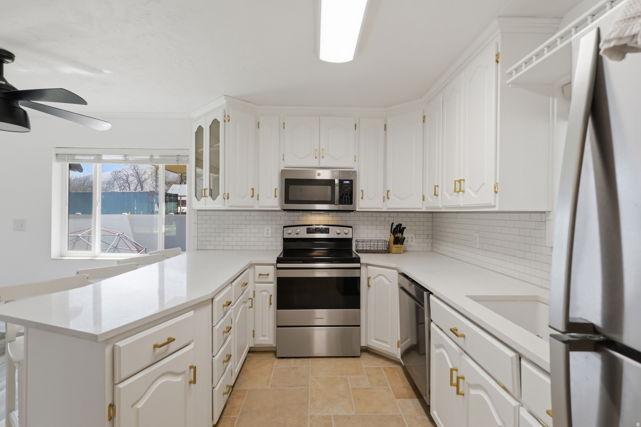 House hacking special! This all-brick rambler offers a rare combination of space, flexibility, and income potential on a large 0.40-acre lot. The home features a fully functional mother-in-law apartment with a separate entrance, second kitchen, and its own laundry-ideal for multi-generational living, house hacking, or generating rental income while maintaining privacy between spaces.  Upstairs, you'll find convenient main-level living with well-sized bedrooms, an open living area, and easy access to the yard. Downstairs, the separate unit is thoughtfully laid out to function independently, making it a true second living space rather than just a basement.  Outside, the property stands out with ample parking, including a circular driveway, RV parking, and plenty of room for additional vehicles, trailers, or toys-something that's increasingly hard to find. The expansive lot provides space to enjoy, expand, or simply appreciate the added privacy.  Whether you're looking for a primary residence with built-in income potential or a flexible investment opportunity, this property offers a practical and versatile setup that's difficult to replicate.  1% credit to be used towards any closing costs when using preferred lender.  This property has a SilverBack Home Warranty and can be transferred to the buyer at closing.  Seller financing is available with a down payment equivalent to the seller's equity. The underlying FHA mortgage is about $280,000 with a sub-3% interest rate.  The FHA mortgage is assumable.