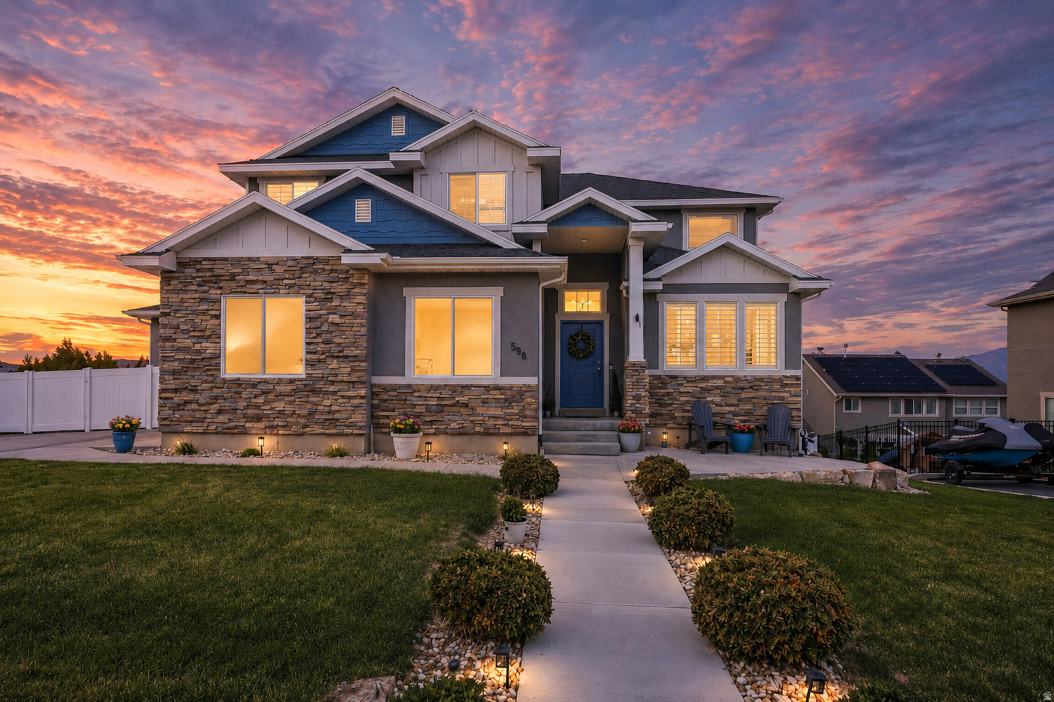 Stunning Grandview two-story in The Benches with breathtaking valley, lake, and mountain views from all three levels. Pride of ownership is evident throughout this beautifully maintained home featuring custom built-ins, plantation shutters, a daylight walkout basement, and eye-catching curb appeal. Situated across from expansive Regal Park with spectacular views and memorable July 4th fireworks, and just minutes from Fitness Trail Park, Island Park, Bellevue Park, and more. A second basement area off the family room can be inclosed for a second den of flex space. 3-car garage, RV parking, and a generous .24-acre lot complete the package.