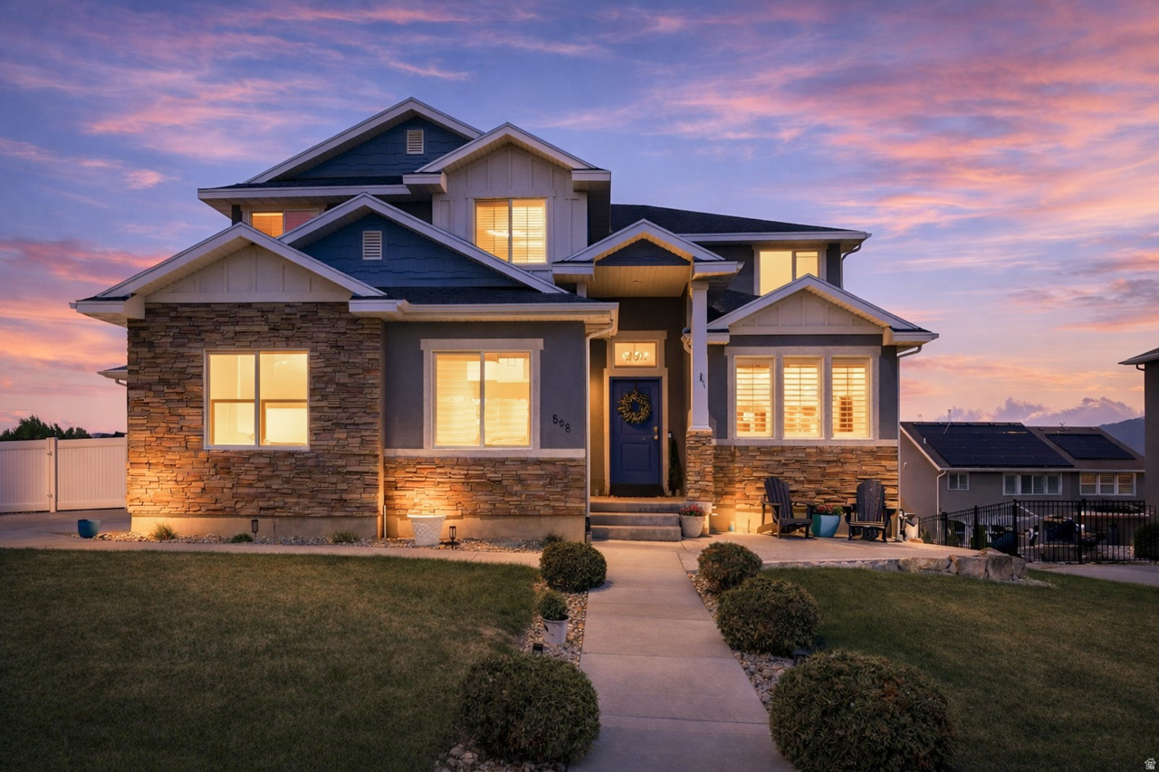 Stunning Grandview two-story in The Benches with breathtaking valley, lake, and mountain views from all three levels. Pride of ownership is evident throughout this beautifully maintained home featuring custom built-ins, plantation shutters, a daylight walkout basement, and eye-catching curb appeal. Situated across from expansive Regal Park with spectacular views and memorable July 4th fireworks, and just minutes from Fitness Trail Park, Island Park, Bellevue Park, and more. A second basement area off the family room can be inclosed for a second den of flex space. 3-car garage, RV parking, and a generous .24-acre lot complete the package.
