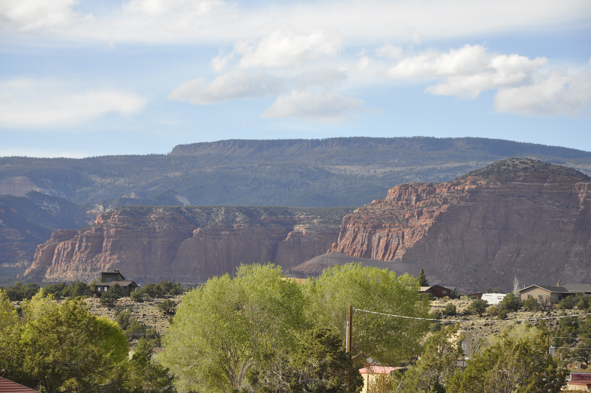 Located right in the heart of Torrey, Utah - the gateway town to Capitol Reef Country - this 1.25-acre lot sits at one of the most coveted intersections in all of southern Utah: the junction of Scenic Highway 12 and Highway 24. One road leads you into Capitol Reef National Park, just 8 miles away. The other takes you on a 123-mile journey through Bryce Canyon, Grand Staircase-Escalante, and the stunning cliff communities of Boulder and Escalante. You're not just buying land - you're buying the crossroads of Utah's greatest outdoor playground. A Dark Sky Destination Capitol Reef National Park became one of the world's 65 International Dark Sky Parks in 2015, and Torrey followed in 2018 when it was named Utah's first International Dark Sky Community. The star-gazing here is genuinely extraordinary - the Milky Way spirals overhead on clear nights, and amateur astronomers have reported seeing the Andromeda Galaxy - over two million light years away - with the naked eye. This designation is a significant tourism draw and an increasingly rare amenity that vacation rental guests actively seek out. Torrey: Small Town, Big Tourism Situated at an elevation of 6,800 feet, Torrey offers tourists pleasant summer weather, proximity to canyons, trails and parks, and wholesome small-town character. That elevation also means Torrey typically runs 10 to 15 degrees cooler than Utah's more popular southern destinations - a major selling point during peak summer travel season. The town offers restaurants, art galleries, a farmers market, lodging, and guided adventure services - everything a visitor needs, without the overcrowding of Moab or Zion.
