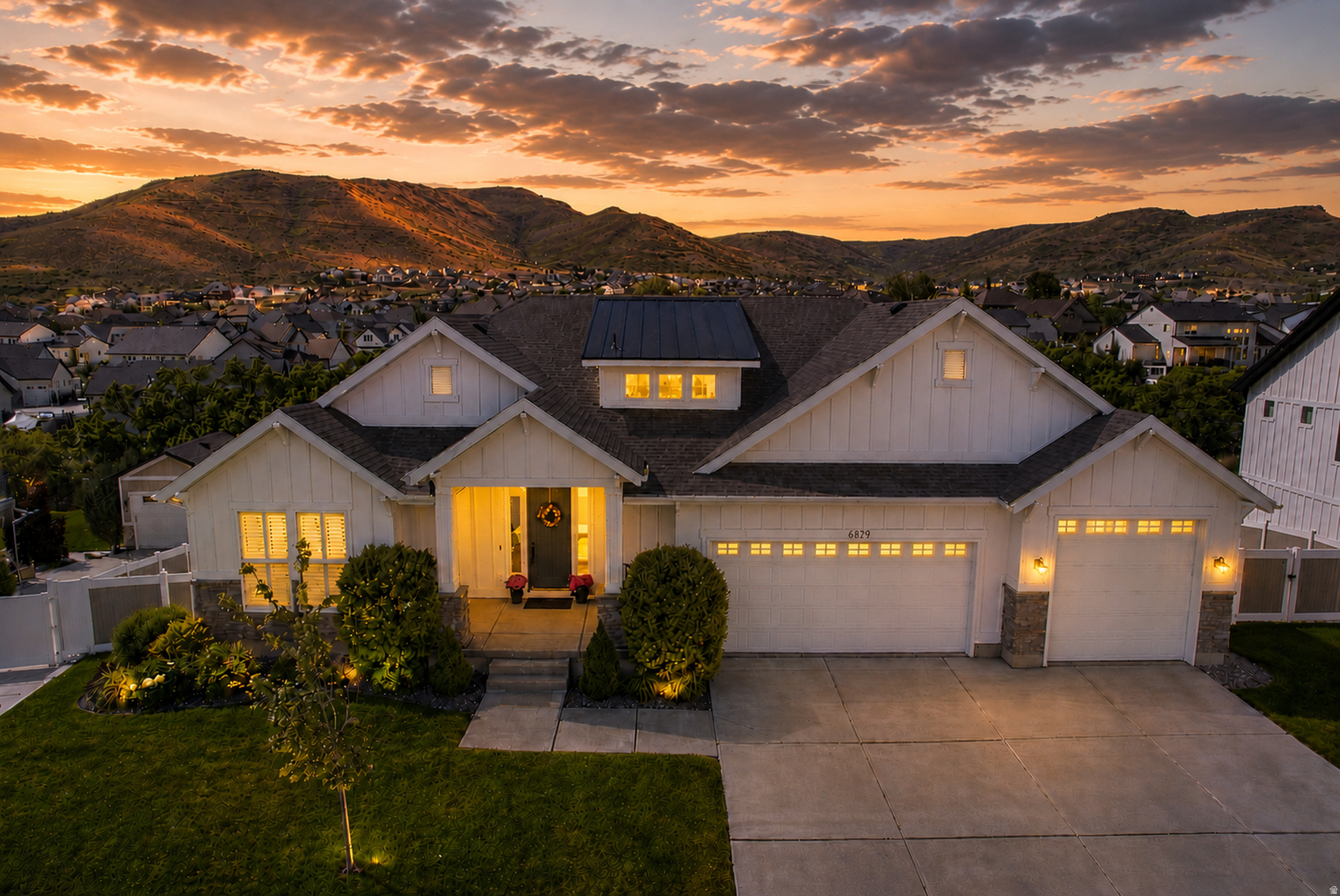 This dream home truly has it all! Nestled on a beautifully curated .33-acre lot bursting with colorful flowers, this custom residence is surrounded by the tranquility of a nature preserve and showcases breathtaking east- and west-facing mountain views. Enjoy stunning sunrises from the expansive deck while deer wander peacefully nearby. Inside, the home offers highly desirable main-level living with soaring vaulted ceilings, a gourmet kitchen with double ovens, and a spacious primary suite featuring an oversized walk-in closet and luxurious en-suite bath. The bright walkout basement is filled with natural light and includes a large media/gaming area, one bedroom, and an additional flex room that can easily become a fifth bedroom at the buyer's request. The oversized garage offers exceptional width and depth, comfortably fitting a full-size truck. Peaceful, private, and thoughtfully designed, this custom home offers an unmatched lifestyle both inside and out.