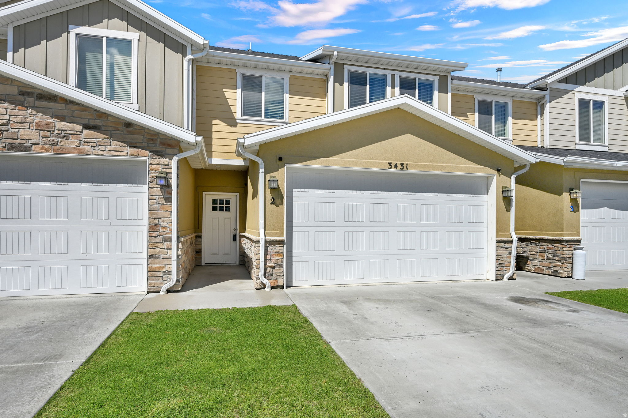 Welcome to this cozy 3-bedroom, 2.5-bath townhome in the Riverbend community! Enjoy a bright open layout, spacious kitchen, and private patio area. Perfect for relaxing or entertaining. The primary suite features a jetted tub for added comfort. Home includes 5 Blink security cameras and extra sound barriers upstairs for peace and privacy. The 2-car garage provides plenty of parking and storage. Conveniently located just minutes from Hill Air Force Base, local restaurants, and shopping. Long-term rentals allowed. Square footage figures are provided as a courtesy estimate only and were obtained from the previous MLS.  Buyer is advised to obtain an independent measurement.