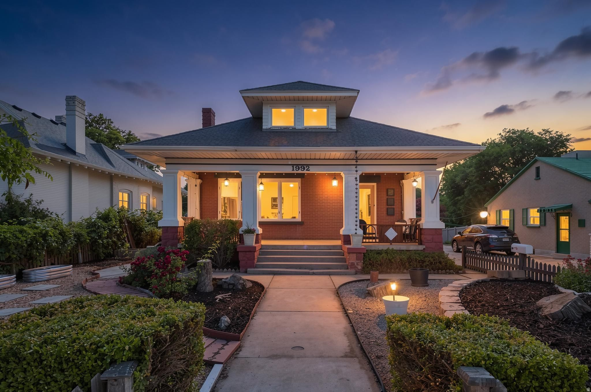 Come visit us June 6th at our Open House 12-2 to see this Grand 1926 Craftsman bungalow on exceptionally large lot in the heart of Sugar House. Rich in character & timeless appeal, this home showcases original architectural details including built-in bookcases, 9-foot ceilings, hardwood floors, pocket doors, bay windows, an original serving buffet & striking tiled fireplaces. The welcoming front porch leads into gracious living & dining spaces filled with natural light & charm. The kitchen offers generous cabinet & counter space, a large center island, serving buffet, walk-in pantry & room for casual dining. The primary suite features a walk-in closet & adjoining office w closet. A charming bath w classic clawfoot tub & an additional bedroom complete the main level. The lower level offers two additional bedrooms, a bathroom, spacious laundry room, bonus room ideal for storage & a large open area perfect for a rec room or creative workspace with direct backyard access. An expansive covered deck overlooks the backyard with mature trees & plenty of space for entertaining, gardening or relaxing. The detached 2-car garage is complemented by a finished workshop, offering flexible space.. Situated on a quiet dead-end street with off-street parking, this property combines historic charm with the space & versatility that are increasingly difficult to find. Just moments from local shops, restaurants & Sugarhouse Park   Details and Square footage figures are provided as a courtesySq Ft from county records..  Buyer to verify all material information.