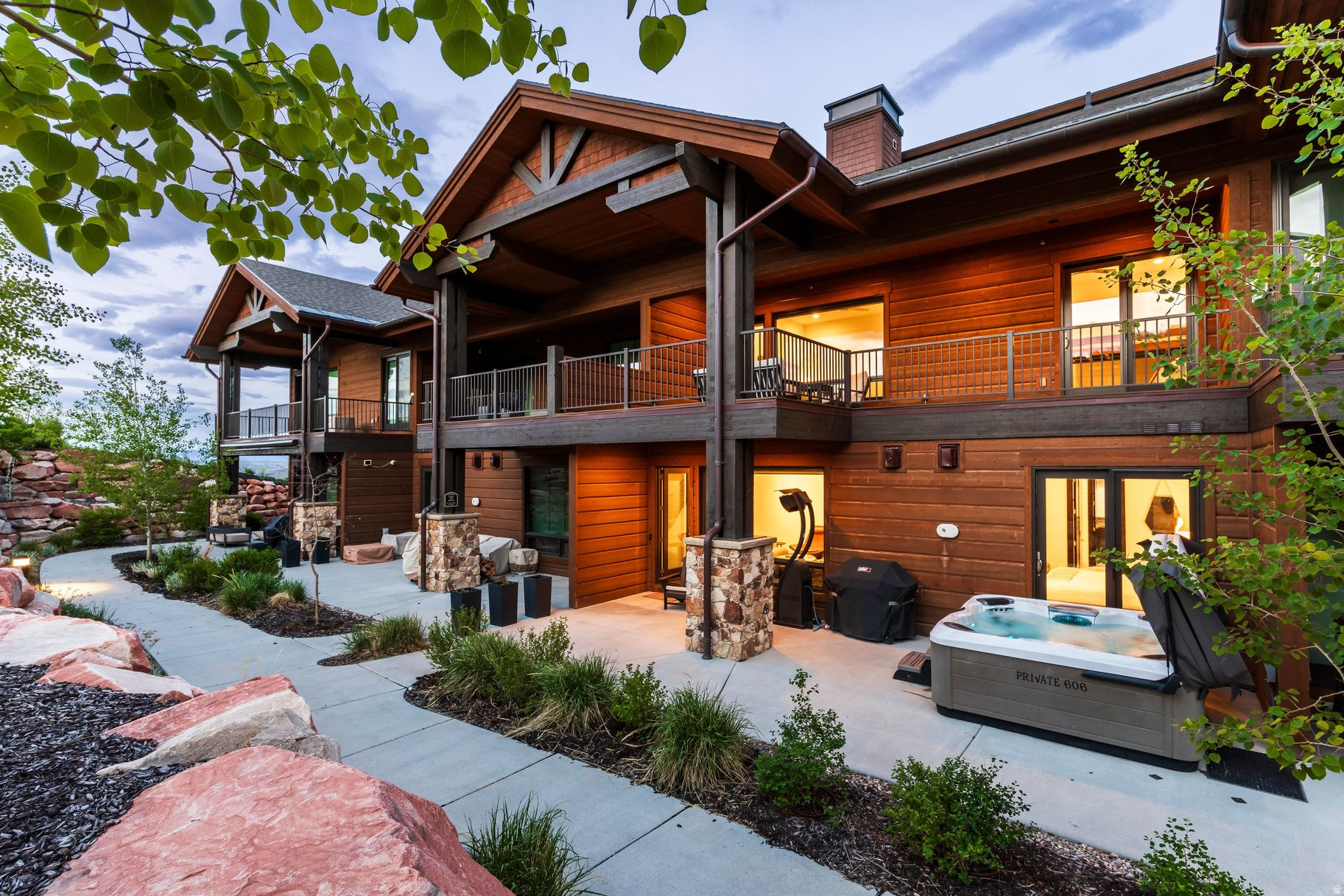 Luxury mountain living meets year-round adventure in this beautifully upgraded and fully furnished residence within Juniper Landing. Ideally located in the heart of Canyons Village, this exceptional home offers convenient access to world-class skiing, hiking, biking, golf, dining, and entertainment. Thoughtfully designed for both comfort and entertaining, the light-filled interior features soaring ceilings, expansive windows, and an open-concept floor plan that seamlessly connects the kitchen, dining, and living spaces. Contemporary mountain finishes, premium appliances, and thoughtful owner upgrades-including a whole-home humidification system and reverse osmosis water filtration-enhance everyday living. Enjoy seamless indoor-outdoor living with an oversized deck and a spacious private patio complete with a hot tub, perfect for relaxing after a day of adventure. Two separate heated one-car garages provide exceptional convenience and ample storage for vehicles, skis, bikes, and outdoor gear. Residents of Juniper Landing enjoy access to outstanding amenities, including a 25-yard heated saltwater pool, year-round hot tub, fitness center, dry sauna, steam room, and fire pit gathering area. Just a short walk from the Frostwood Gondola, this turnkey residence offers an exceptional opportunity to enjoy the Park City lifestyle in every season.