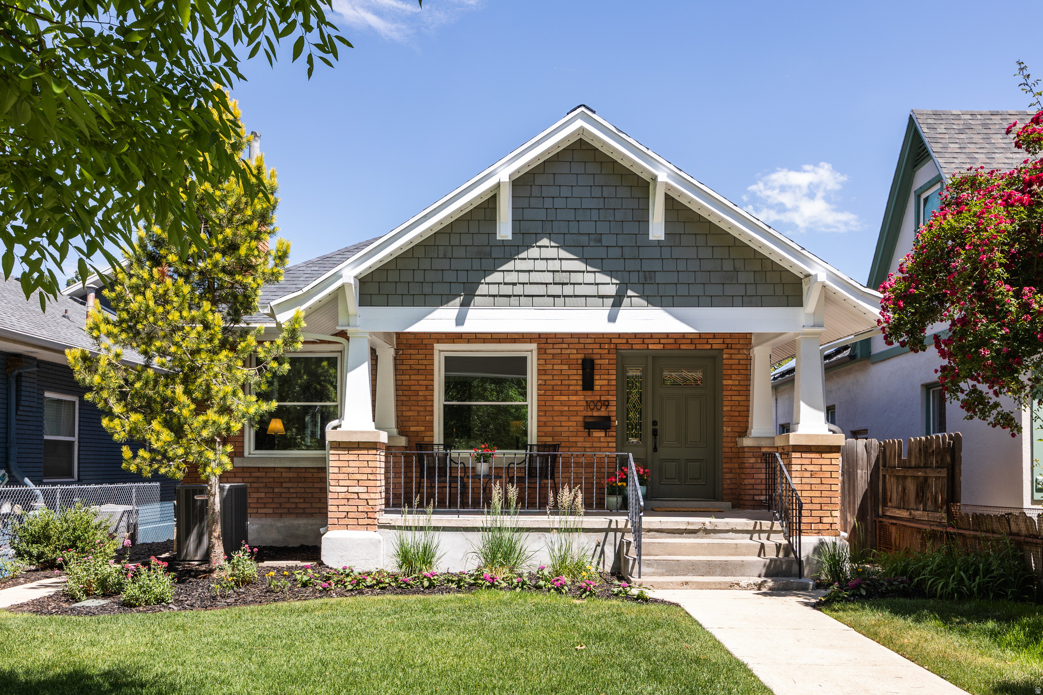 There's something to be said for the quintessential Sugarhouse bungalow. Always in style and effortlessly charming, these timeless beauties are as easy to love and live in as they were 100 years ago. Clocking in at 2,700 square feet, this beautifully updated home offers all the modern conveniences you want alongside some lovely vintage character. A deep porch (perfect for sipping a cool drink and reading a good book) welcomes you into a well-sized foyer, for those who love a proper entrance. Updated windows flood the space with natural light, and the flow here from living to dining to kitchen is seamless, thanks to strategically connected spaces that strike the perfect balance between open-concept and a more traditional layout (and who doesn't love a cozy living area anchored by a gas fireplace that can be enjoyed all winter?). For those who live to entertain, the dining area offers room for a large table, if desired, while the kitchen makes the perfect spot to pull up a well-designed stool for a more informal perch. The primary bedroom stands out here-a thoughtful addition offers room for a king bed, along with some space for a desk or reading corner. Two additional rooms on the main floor can flex as office or guest space, and the main bathroom's clawfoot tub and charming tile lead the way to unwinding after a long day. The lower level isn't the average Sugarhouse basement; tall ceilings with new recessed lighting make the space feel expansive and bright. With a newer roof and HVAC, you can move into this property with peace of mind, and there's little that competes with that. This coveted location also enables residents to easily access a few of our city's best eateries on foot: walk to Finn's Cafe, The Red Moose, Hruska's Kolaches, and so much more.  Owner/Agent.   Square footage figures are provided as a courtesy estimate only. Buyer to verify all information.