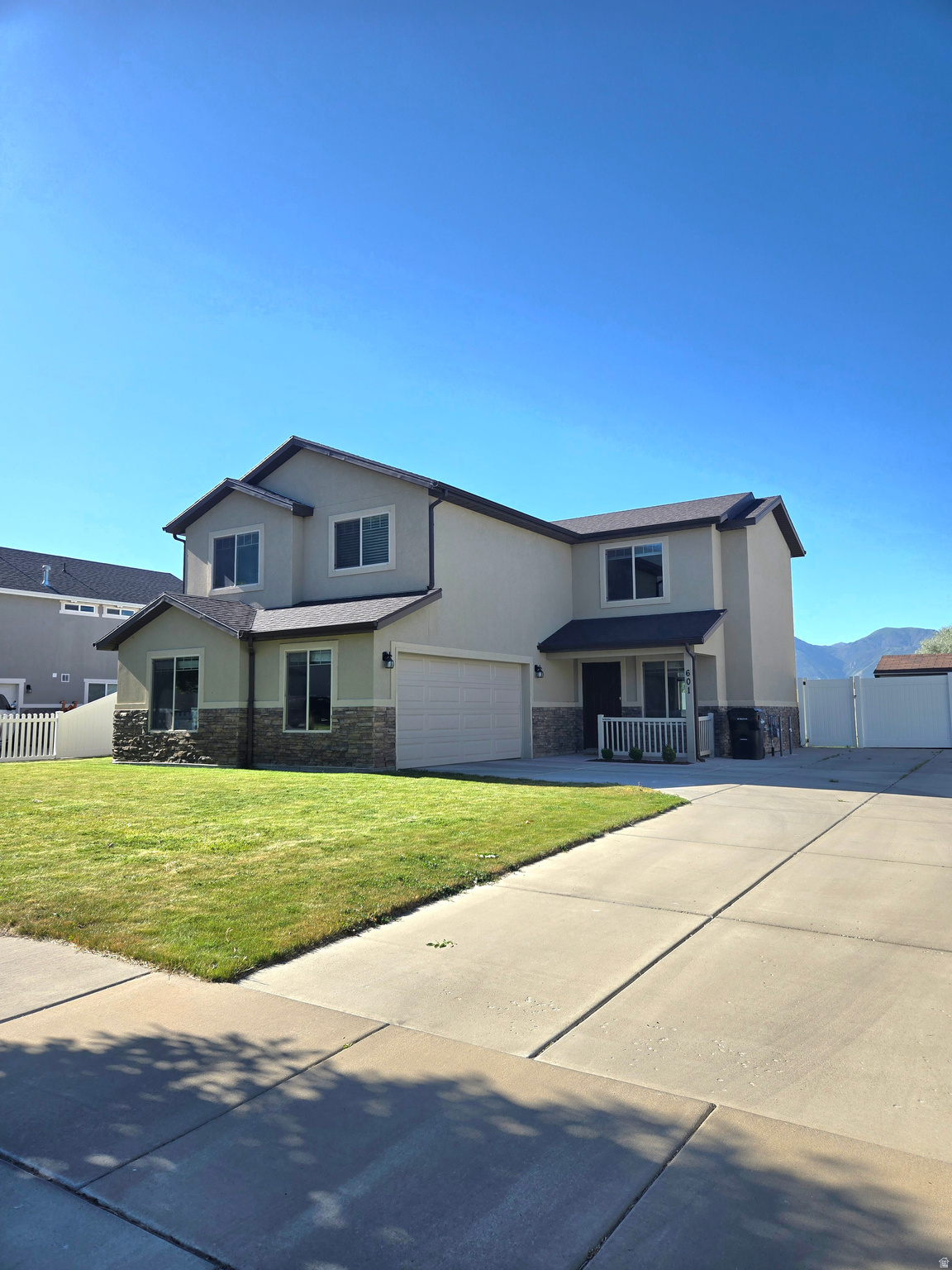 Welcome to this beautiful 4-bedroom, 2.5-bath home in the heart of Springville. It is located in an amazing friendly neighborhood, within walking distance of Westside Elementary, Hobble Creek Trail, and several nearby parks. Built in 2015, this inviting home offers an open-concept layout that seamlessly connects the kitchen and living areas, creating the perfect space for both everyday living and entertaining.  Large windows throughout the home provide abundant natural light, enhancing the bright and welcoming atmosphere. The thoughtfully designed floor plan offers comfortable living spaces and modern functionality for today's lifestyle. The kitchen features ample workspace and storage, and all kitchen appliances are included, making this home truly move-in ready.  Outside you can enjoy breathtaking mountain views from the backyard, featuring a custom pergola, patio, fully fenced yard, and a playset-ideal for relaxing, entertaining, or family fun. The low-maintenance yard provides a clean and attractive outdoor space without extensive upkeep.  Conveniently located near Smith's Marketplace, local restaurants, recreation opportunities and quick I-15 access, this home offers easy access to everything you need while maintaining a peaceful neighborhood feel.  Don't miss this opportunity to own a move-in-ready home in one of Springville's most desirable locations, combining comfort, convenience, and beautiful mountain views.