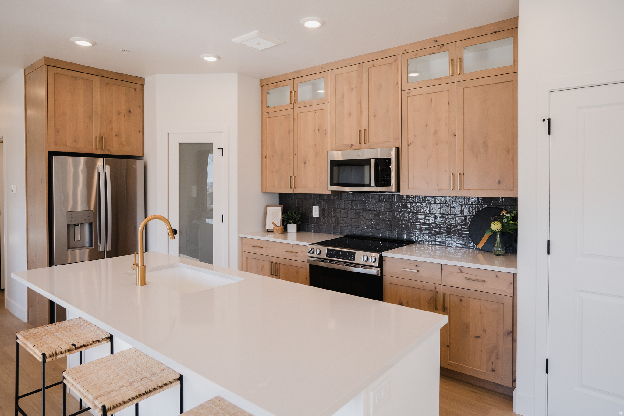 Available now! $10,000 in builder flex incentive. Upper Level Expanded Condo in desirable River Run community located across from new Spanish Fork Rec Center. 9' ceilings w/large, picture windows w/abundant lighting. All interior selections have been made by our professional designer and they are gorgeous! Located near outdoor pool, clubhouse, pickleball courts and playground. Nearby Walking and Biking Trails. Close to rodeo arena, ball fields, shopping and restaurants.