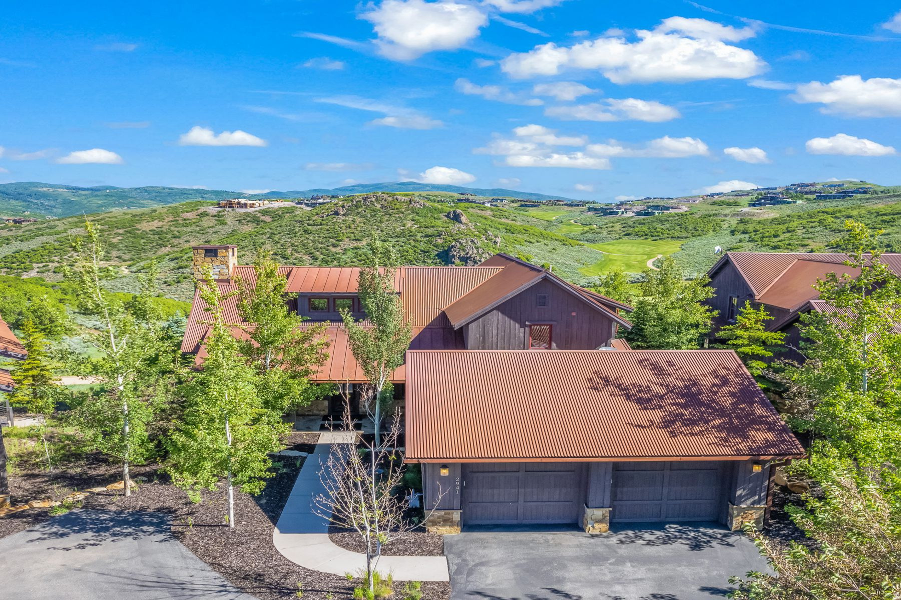Coveted Promontory Trapper Cabin Offering Privacy, Views & Full Golf Access -- Full Golf Membership available with this refined mountain retreat, ideally positioned at the end of a private cul-de-sac within the gates of Promontory Club. Located in the highly coveted Trapper's Cabin enclave. This thoughtfully designed 3-bedroom, 2.5-bath residence offers some of the best golf course views in Promontory. Overlooking the 8th hole of the Pete Dye Canyon Course, with panoramic views extending to the 15th and 16th holes, the home enjoys a peaceful, elevated setting with spectacular perspectives across three iconic golf holes-while maintaining exceptional privacy. Facing east, the residence captures beautiful early morning light while offering a cooler and more comfortable setting in the afternoons. Light-filled interiors, quality finishes, and an open-concept layout create a seamless blend of comfort and sophistication, ideal for both everyday living and entertaining. The primary suite is conveniently located on the main level, offering ease and privacy, while additional guest accommodations provide ample space for family and visitors. Just moments from the Village Clubhouses, owners enjoy effortless access to dining, fitness, pools, and year-round amenities. The combination of premier location, exceptional views, and Full Golf Membership creates a truly one-of-a-kind Promontory residence-equally suited as a full-time home or lock-and-leave mountain retreat. Professionally designed interior and sold fully furnished.