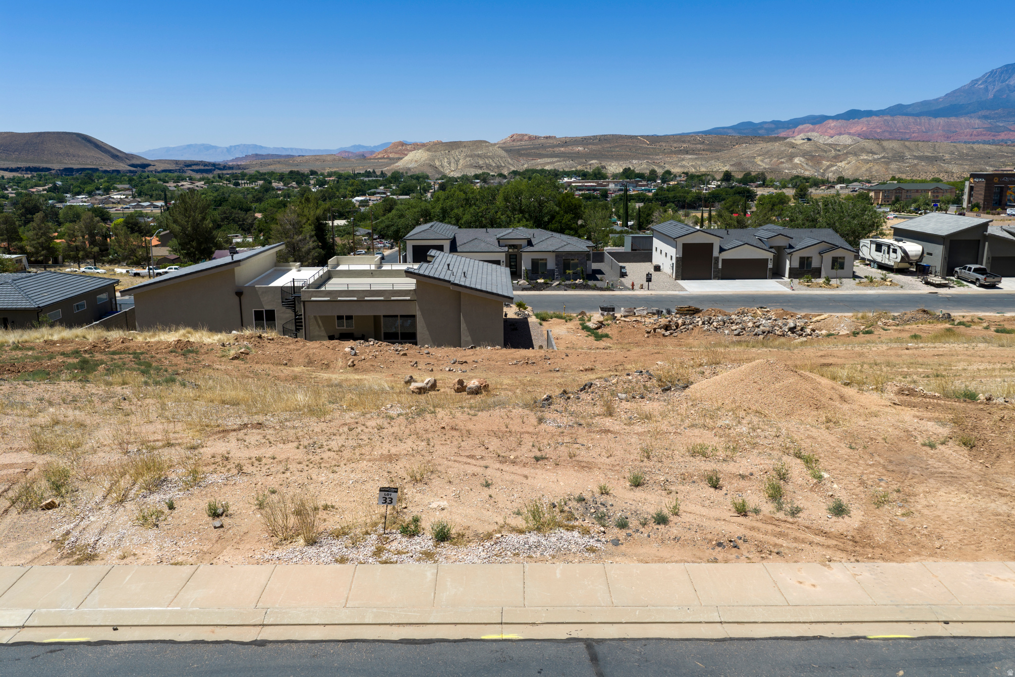 Conveniently located in La Verkin just minutes from Zion National Park, this .23 acre lot has walk-out basement potential. Providing the perfect opportunity to build in Southern Utah without the burden of HOA fees, this affordable building lot has a lot to offer. Tucked into a relaxed neighborhood, you will enjoy sweeping views of the valley and surrounding red rock mesas without paying premium resort prices.