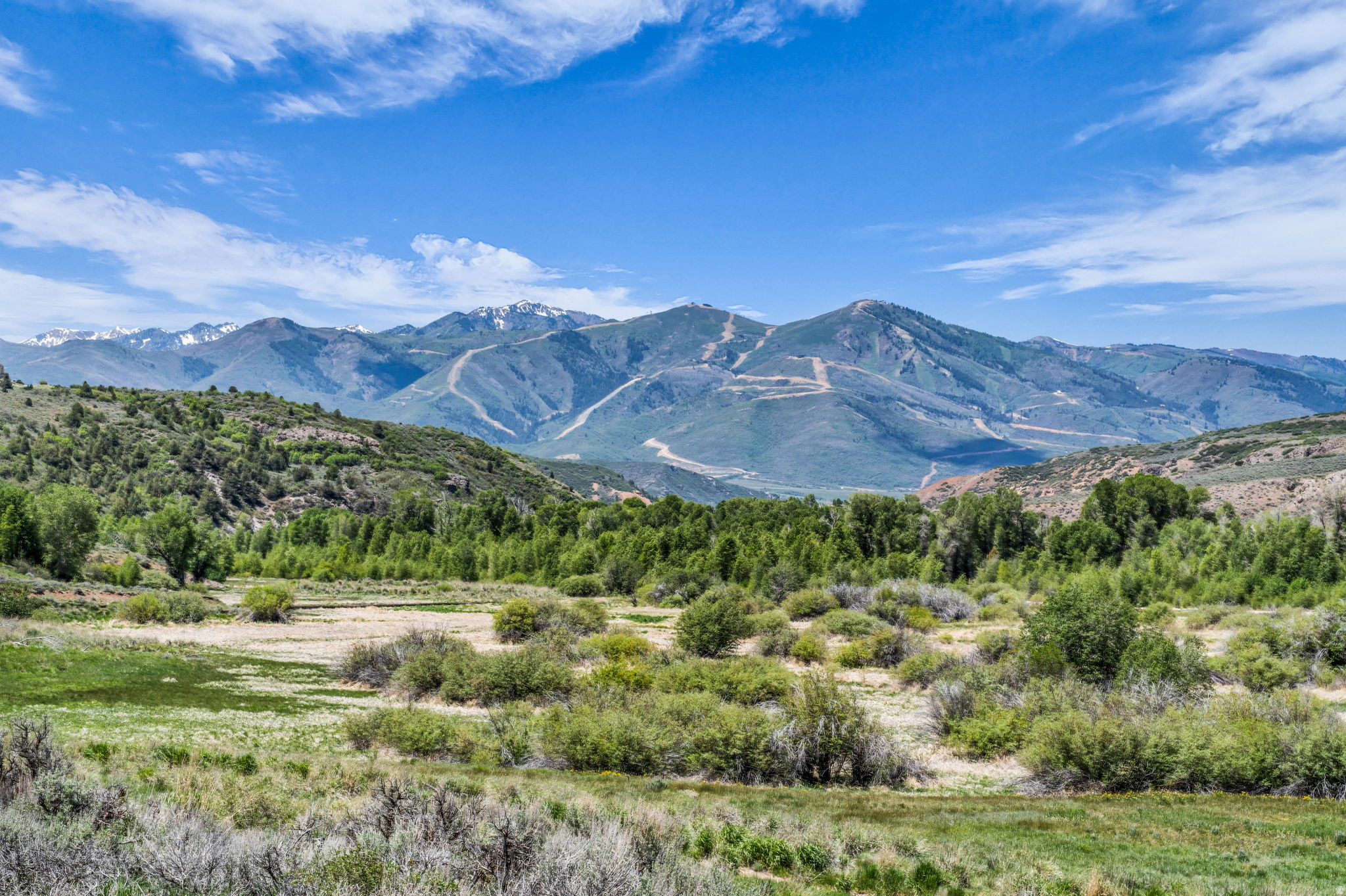 One of Victory Ranch's Premier Homesites, Lot 22 offers unobstructed views of Deer Valley with protected open space & the river trail below, creating an endless backdrop. This flat 1.19 acre homesite offers a generous building envelope, making the building process straightforward and efficient. Just a short walk to The Post, where owners can unwind & relax by the pool, grab lunch and take in the surrounding rock cliffs and scenery. Victory Ranch is a premier four-season ranch club community spanning 6,250 acres, including over 3,500 acres of pristine backcountry. Amenities include Utah's #1 ranked golf course, four miles of the Upper Provo River for world-class fly fishing, multiple clubhouses and restaurants, biking and hiking trails, a 5-stand shooting facility, ATV and snowmobiling adventures, a Park City ski lodge on Main Street, ice rink, backcountry yurts, fishing ponds, pools with a waterslide, tennis and pickleball courts, and The Barn featuring an art studio, game room, indoor basketball court, fitness center, and luxurious spa. Plat map is attached to the listing.
