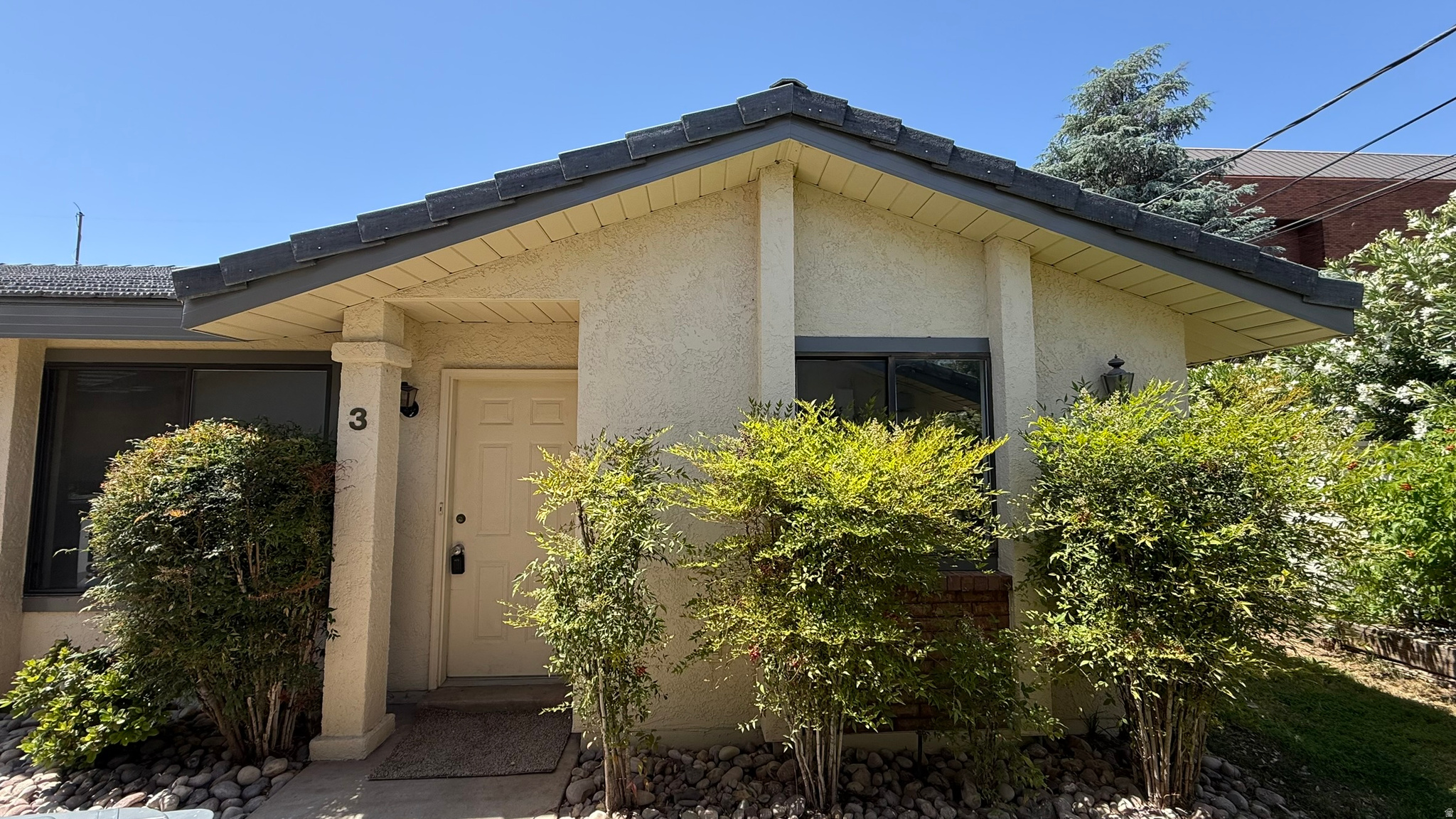 Fully remodeled and tucked in a quiet corner of Downtown St. George you will find this end unit townhome that has been completely renovated. The building has a brand new roof, new paint/stucco, and an impeccable yard. With a relaxed HOA, mature trees, no back yard neighbors, and walking distance to anything you need downtown this 2 bed, 2 full bathroom home is perfect for just about anyone. A new HVAC, water heater, countertops, all new flooring and paint, fixtures, and faucets will provide significant peace of mind for years to come. One of two end units with a fully fenced back yard and a side yard adds value and extra space. The home also backs up to two quiet office buildings that are always empty on the weekends. Walk to shopping, restaurants, Utah Tech, parks, pickleball courts, and town square. Call now for a showing owner/agent.