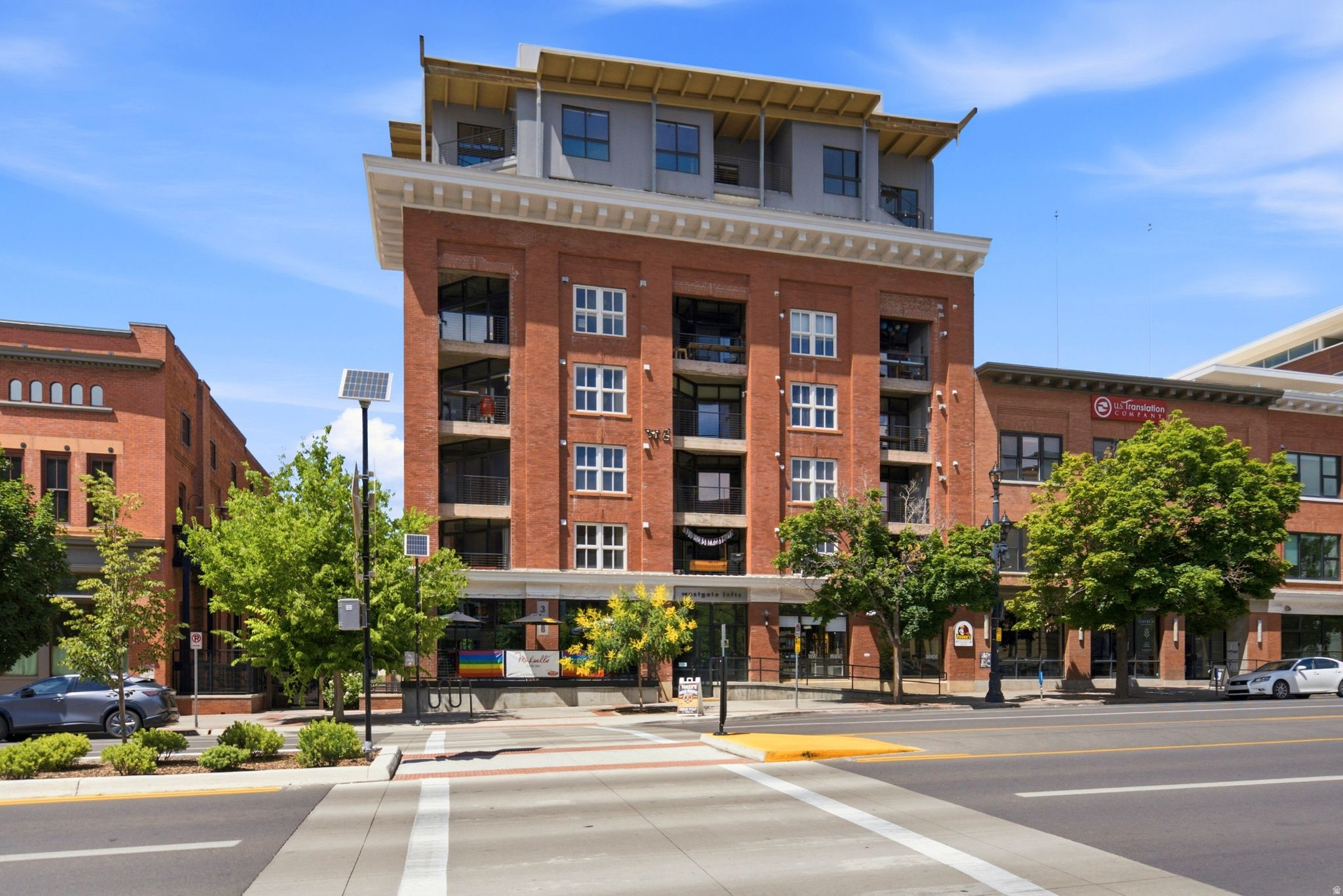 INDUSTRIAL CHIC MEETS DOWNTOWN SALT LAKE CITY LIVING.  Unlike anything else you'll typically find on the market, this one-of-a-kind loft at Westgate Lofts delivers authentic urban character with a style all its own. Exposed brick, concrete accents, soaring ceilings, and industrial-inspired finishes create a space that feels straight out of a downtown warehouse conversion while still offering comfort and functionality.  This unique studio loft lives much larger than its square footage, featuring distinct areas for living, sleeping, and relaxing that create the feel of a true one-bedroom layout while preserving the open-concept loft aesthetic. Natural light fills the space, and the private balcony overlooks the beautifully maintained courtyard below, offering the perfect spot to enjoy your morning coffee or unwind after a long day.  Whether you're an executive who frequently travels to Salt Lake City and needs a great space, or someone who simply craves the energy and convenience of urban living, this residence offers an unmatched lifestyle. Residents enjoy access to inviting community spaces, including a fire pit gathering area and barbecue facilities, perfect for entertaining friends or enjoying warm summer evenings.  Step outside your door and immerse yourself in everything downtown Salt Lake City has to offer. From award-winning restaurants and coffee shops to sporting events, concerts, nightlife, and cultural attractions, the very best of the city is just moments away.   LOCATION HIGHLIGHTS: Walkable to restaurants, coffee shops, breweries, and shopping.  Minutes to Downtown Salt Lake City entertainment and nightlife.   Near the Delta Center, theaters, and cultural attractions.  Convenient access to TRAX and major freeway connections.   Approximately 10 minutes to Salt Lake City International Airport. Easy access to the University of Utah and the downtown business district  Perfect for the buyer seeking a true loft lifestyle with authentic character, modern convenience, and an unbeatable downtown location.