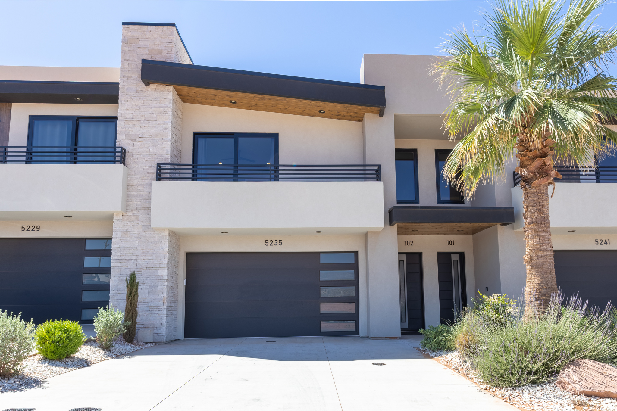 If you're looking for an investment property or a family vacation home that you can rent on the side, definitely add this to your list. Not just hype, here's why we say that. First off, the finishes - everything is beautiful and luxurious, but also durable. Nightly rentals have a lot of traffic. You don't want vinyl or carpet, you don't want builder grade cheap cabinets, or normal vinyl windows. This unit has tile throughout, solid wood drawers with dove tail joinery, soft close slides, and commercial grade Low-E 366 windows with the thermally broken aluminum frames. Open web trusses between levels filled with insulation for maximum sound deadening and more efficient HVAC duct flow. Tile baseboard in the bathroom so you'll never get that typical swelling and discoloring of mdf base. Backyard misting system to keep the summer cool, private hot tub, putting green and palm tree, epoxy flooring in the garage, under-shelf lighting in the living room surrounding the 60'' fireplace and TV, 3cm granite countertops, a butler pantry, soaker tub and double showered in master, tile showers in other bathrooms too - and so many more little details. Also, property comes fully furnishes just as it is. Secondly, the amenities. 10,000 sq ft clubhouse covered in luxury as well, event space, restaurant and bar, golf simulators, arcades, pool, action river, hot tubs, surf machine, cabanas, splash pad, and more. Tons of fun and tons of relaxation for all ages, and a huge reason for guests to choose your home when coming to vacation in Southern Utah. Come take a tour. appointment needed, unit is often occupied. Listing agent or rep will meet you on site to guide you through the amenities. Buyer to verify all info