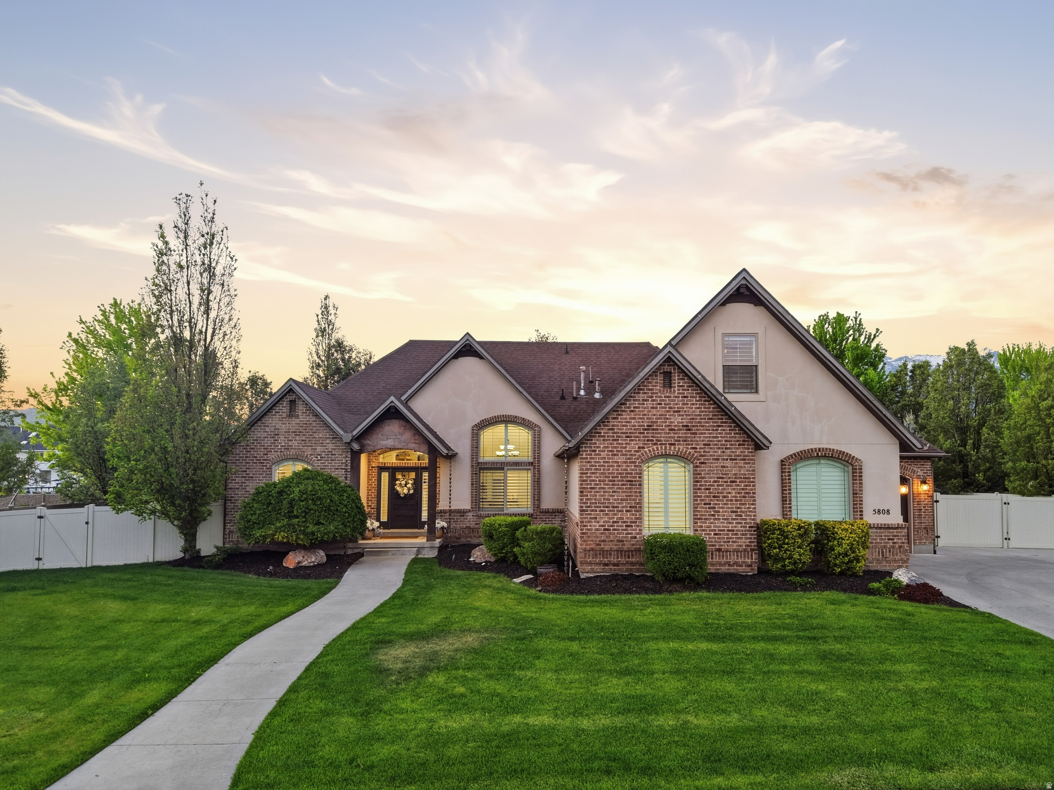Located in one of Highland's most sought-after neighborhoods, this updated home sits on just under half an acre and offers over 5,600 square feet with room to spread out, gather, and entertain. From the moment you walk in, the home feels open, welcoming, and built for real life. The fully walkout basement includes a second kitchen and separate washer/dryer hookups, giving plenty of flexibility for multi-generational living, guests, or future apartment potential.  The backyard is the kind people dream about...pool, hot tub, built-in outdoor kitchen, fire pit, and space to actually enjoy it all. Whether you're hosting a crowd or just enjoying a quiet night at home, this property was made for both. Beautifully maintained, homes like this don't come around often.    Included in the sale of the home is the outdoor patio furniture, and the bedroom set located in the main floor guest bedroom. Square footage figures are provided as a courtesy estimate only and were obtained from an appraisal.  Buyer is advised to obtain an independent measurement.
