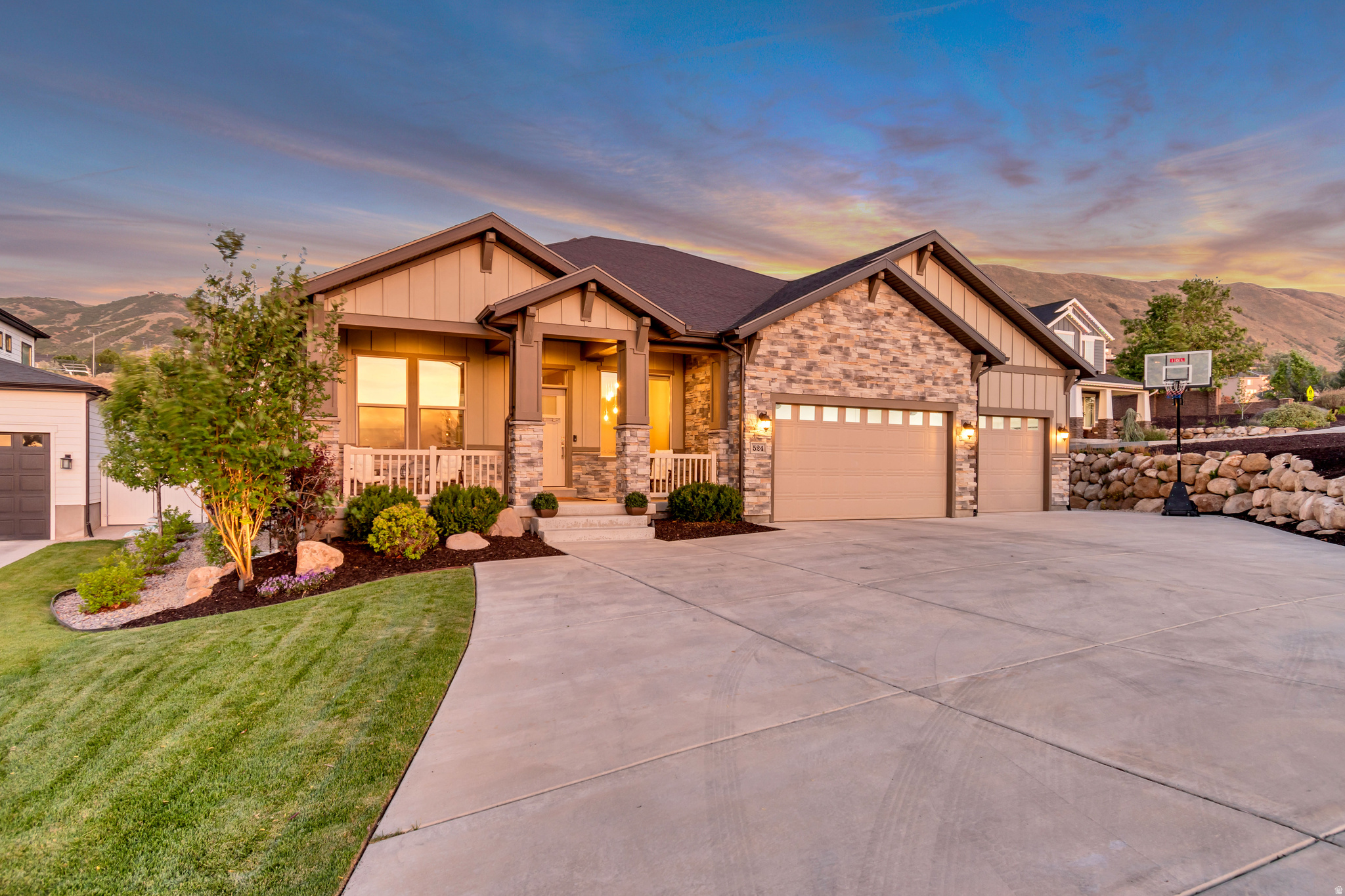 Stunning Draper Home with Elegant Upgrades, Spa-Like Amenities & Prime Location! This beautifully updated home in Draper offers an abundance of natural light and spacious living thanks to 10-foot ceilings on the main floor, upgraded 9-foot ceilings in the basement, and a dramatic 12-foot dining nook. Taller-than-average doors and door frames are perfectly proportioned to the high ceilings, while upgraded large windows throughout flood the home with light and showcase the surroundings. Inside, enjoy brand new carpet throughout, a gourmet kitchen featuring a new 5-burner gas cooktop, and a generous walk-in pantry. The standout basement bathroom delivers a true spa-like retreat complete with a sauna and steam shower-perfect for relaxation after a long day. Step outside to a graded, flat backyard ideal for play or entertaining, featuring a two-tier rock retaining wall, gas fire pit, and pond-less water feature. The yard is fully fenced with gates on each side, fully landscaped with mature trees, and enhanced by beautiful lighting. Additional highlights include owned solar panels, a large flat driveway, and a finished garage with tall ceilings and durable epoxy flooring. Unbeatable Location  Walk to hiking trails and the recreation center. Just a 2-minute drive (and walking distance) to Oak Hollow Elementary (French Immersion). Enjoy a 5-minute drive to shopping and the freeway, and 5-10 minutes to Draper Park Middle School and Corner Canyon High School. This move-in ready home perfectly combines luxury finishes, thoughtful upgrades, and an incredible Draper location. Don't miss it!