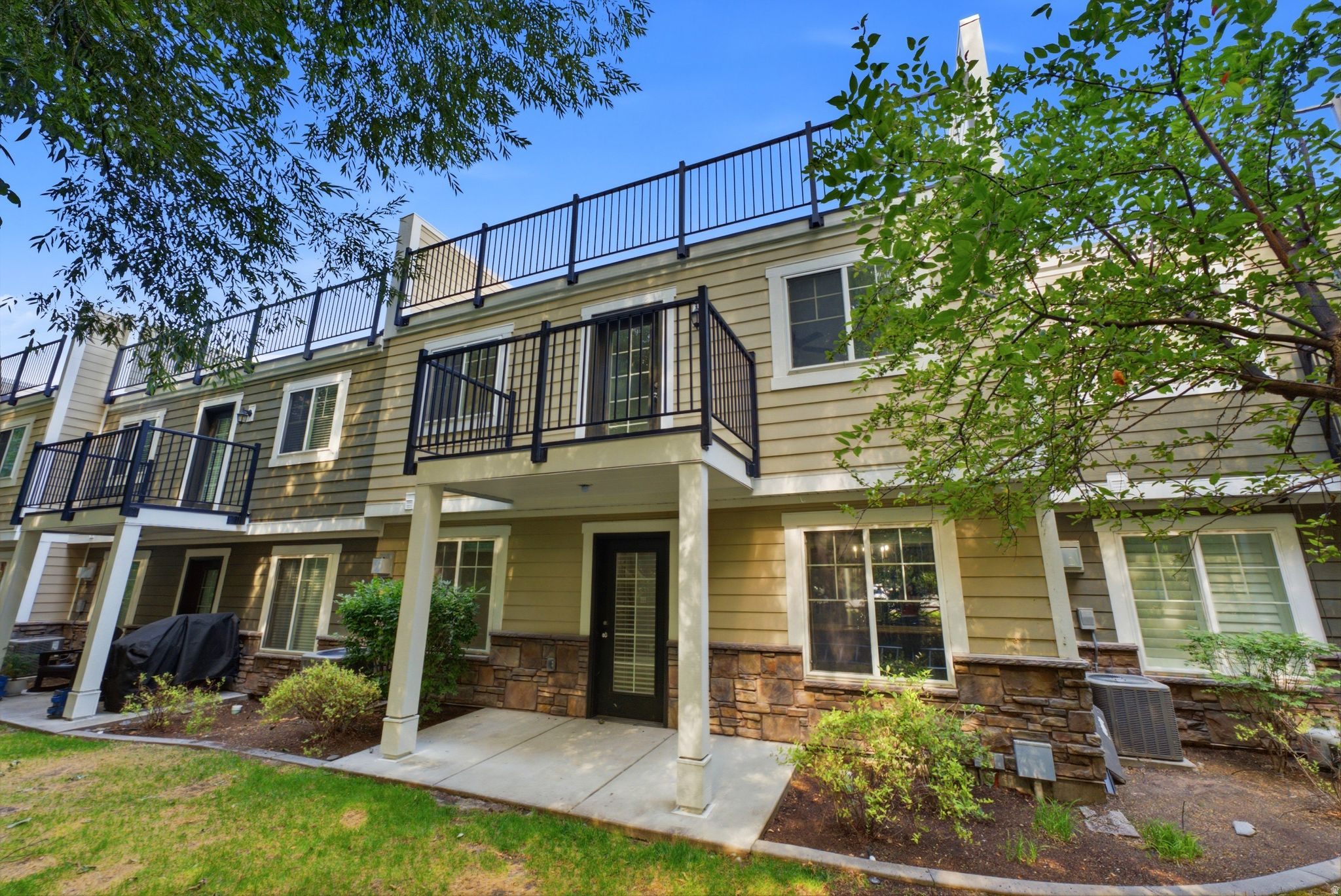 Nestled in Logan's desirable River Crossing community, this beautiful townhome offers the perfect blend of style, comfort, and convenience. Brand-new carpet has just been installed, complementing the home's thoughtful layout and spacious design. Enjoy multiple outdoor retreats with a rooftop deck ideal for gathering with family and friends, as well as a private deck off the primary suite that creates a peaceful escape. Located near walking trails, Logan River Golf Course, shopping, dining, and Utah State University, this home places the best of Cache Valley right outside your door. Price includes seller paying the current HOA assessment in full at closing. Buyer and agent to verify all.