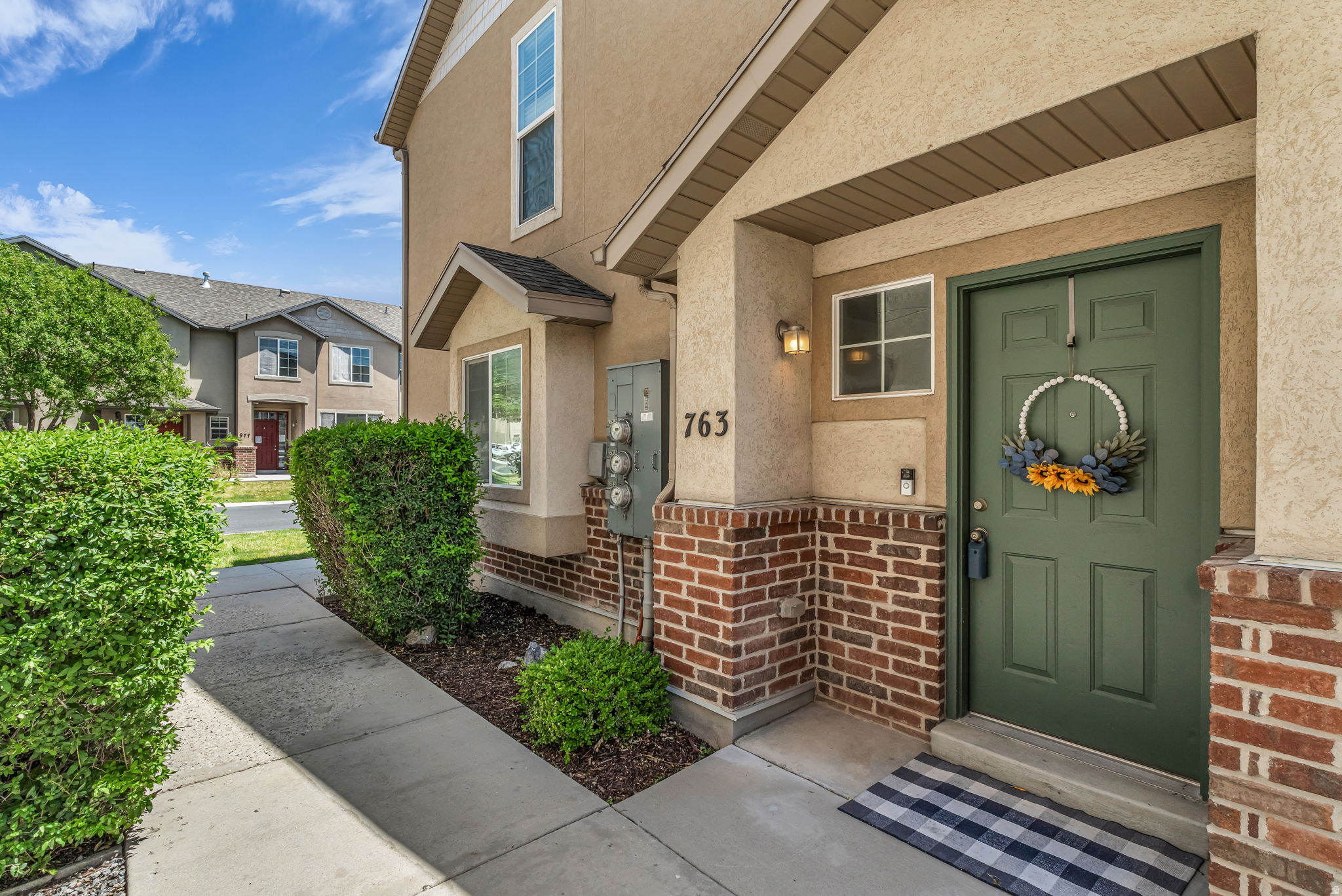 Welcome to this well-maintained townhome in the highly desirable Foxboro community of North Salt Lake! This move-in-ready home features an open and inviting floor plan with vaulted ceilings, abundant natural light, and a spacious great room perfect for relaxing or entertaining. The kitchen offers ample cabinet space, modern appliances, and a functional dining area. The primary suite includes a walk-in closet and private bath, while the second bedroom and full bath provide flexibility for guests, a home office, or additional living space. Enjoy mountain views from the private deck and the convenience of an attached garage. Community amenities include a clubhouse, fitness center, swimming pool, playgrounds, and beautifully maintained common areas. Ideally located just minutes from downtown Salt Lake City, shopping, dining, Legacy Parkway, and I-15, this home offers the perfect combination of comfort, convenience, and low-maintenance living. Square footage figures are provided as a courtesy estimate only and were obtained from county records.  Buyer is advised to obtain an independent measurement.