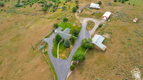 ATTENTION ALL BUILDERS, DEVELOPERS. JUST LISTED, STUNNING & SECLUDED SANTAQUIN EAST BENCH PREMIERE PROPERTY, BEAUTIFUL 69.5 ACRE UTAH COUNTY DEVELOPMENT LAND WITH HOME AND THE MOST BREATHTAKING VIEWS SURROUNDING ALL SIDES. There are multiple land parcels that make up the approx. acreage. Very seldom does a property of this size in this area come available! Sweeping views of the Wasatch Front Mountains and the Gorgeous Valley View. Green pastures and a serene atmosphere that is simply hard to come by. Centrally located and nestled in the heart of one of Utah County's fastest growing communities. Santaquin is where growth, development and all things are happening. Minutes to I-15, 20 minutes to Provo, one hour to SLC. Approximate address is 14717 S 5200 WEST - SANTAQUIN, UTAH 84655. The listing includes the following parcels, 32:018:0294; 32:018:0043; 32:018:0042; 32:018:0041; 32:018:0040. Taxes are also an estimate, as the property has been in greenbelt. Listing Agent and listing brokerage accepts no responsibility or liability for the information contained in this listing. Any interest party buyer and or buyer broker should conduct an independent inspection and investigation to verify the information contained here. Seller's agent is related to the seller.