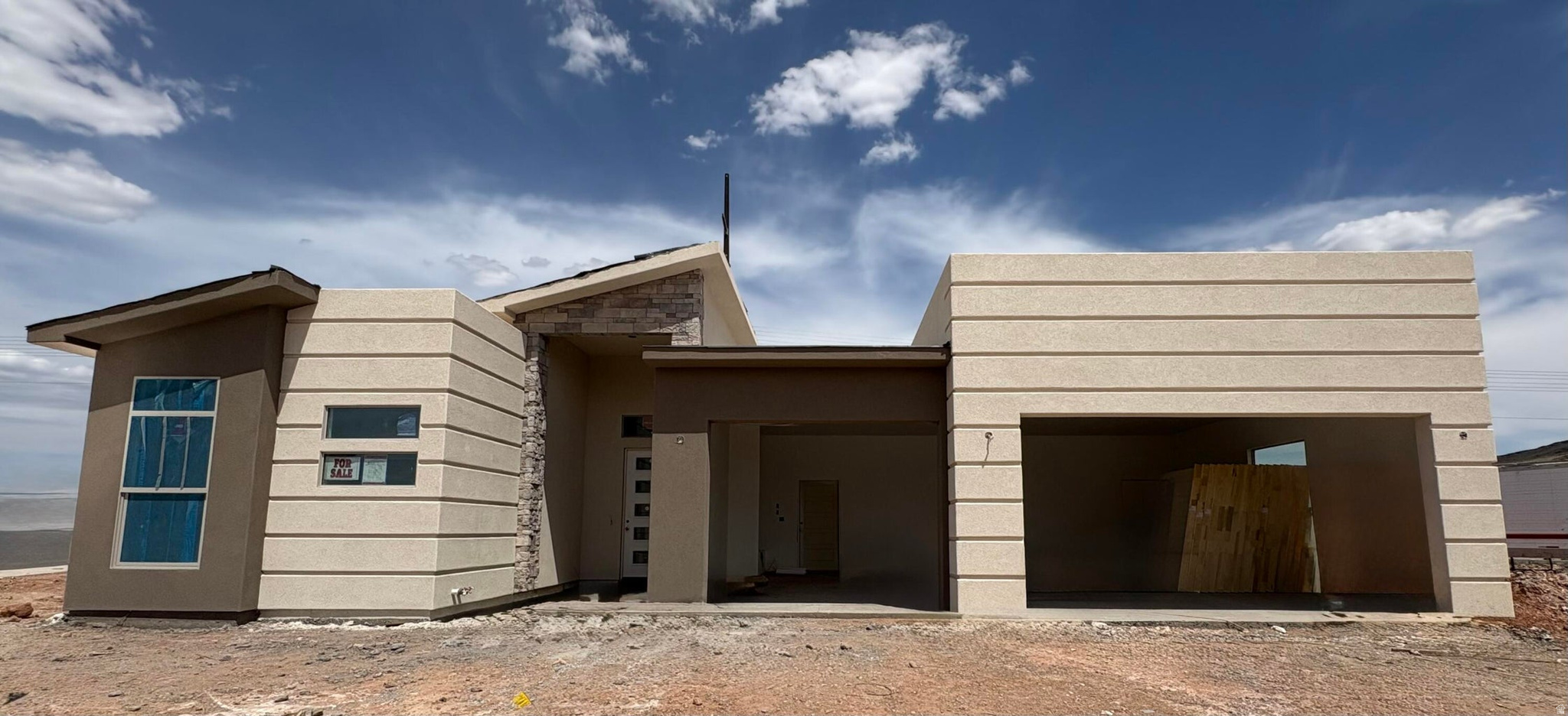 Close to Sand Hollow and Quail Creek Reservoirs! Check out this CASITA plan! This single story home has a total of 2,459 sq ft. The main house has 3 bedrooms and 2 baths with a 3 car garage. The casita has living area, kitchenette, 1 bedroom, 1 bath with stacked washer/dryer hookups, access casita from main house or exterior covered patio entry. Featured throughout entire home LVP flooring in main living areas, soft close cabinets, quartz countertops throughout, 8' glass front door, tiled tubs and showers, black plumbing fixtures, front and backyard landscaping too! Come by and see the S&S Homes' difference! Call or text to set up a time to view this home!