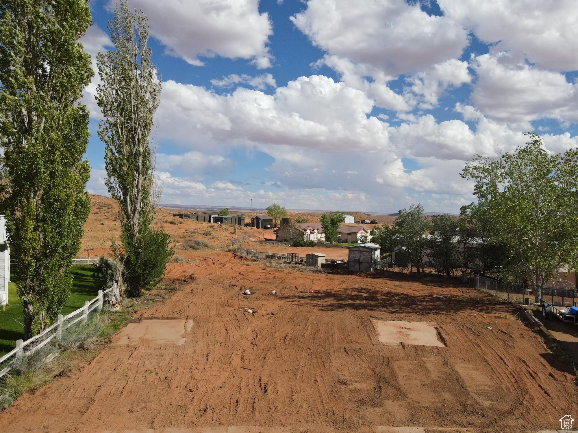 Make this desert playground your getaway from it all. This easy to manage 0.10 acre lot is the perfect set up for a vacation home with quick access to Bullfrog Marina at North Lake Powell as well as adventurous desert entertainment.   Buyer to verify square footage. CCR's in Place Home must be on a permanent foundation.  Life is short- get out there and play!!!