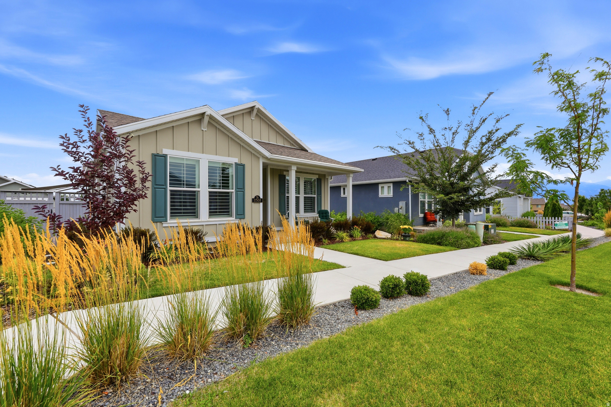 Come join the fun and enjoy the best chapter of your life at Springhouse Village, an active 55+ community in Daybreak.  This gorgeous rambler has it all, location, a beautifully zero-scaped oversized yard with retractable awning, leaf filter gutters, gourmet kitchen with double ovens, walk in Euro-shower in the primary suite, abundant light throughout and so much more!  Enjoy low maintenance living and exceptional community amenities all designed to help you make the most of every day. This is the lifestyle you've been waiting for!  Schedule your private showing today!