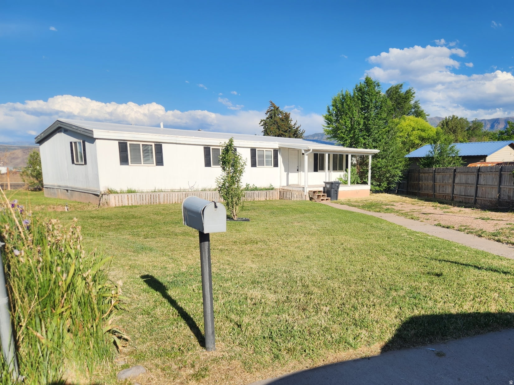 Remodeled home with great master quite. Spacious open concept living/dining/kitchen. 4 full bedrooms and 2 bathrooms. Utah Heritage Bank   can offer in house financing loan with 20% down. Square footage figures are provided as a courtesy estimate only and were obtained from the county.  Buyer is advised to obtain an independent measurement.