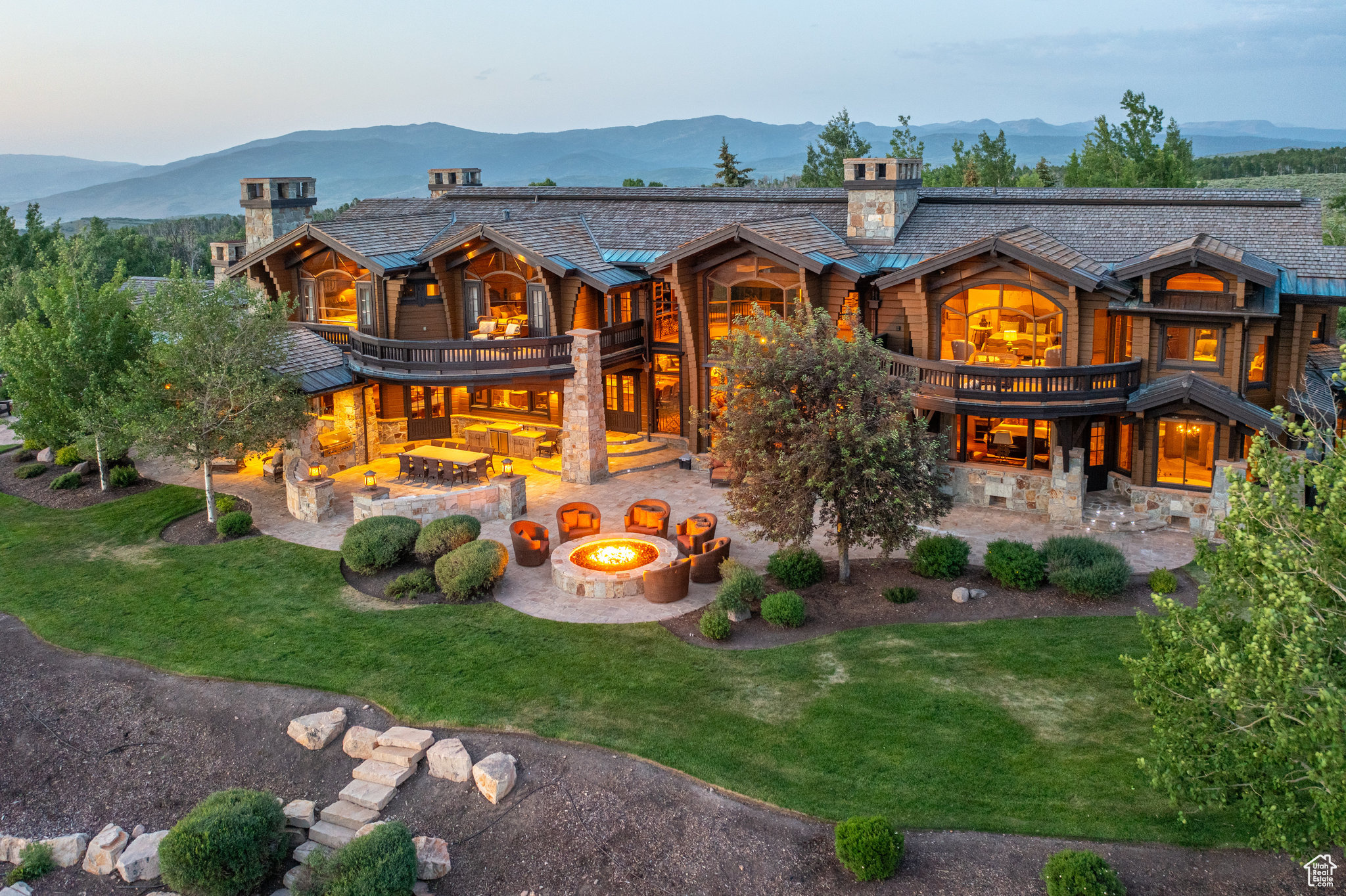 An Estate offering the pinnacle of luxury mountain living, offering refined craftsmanship on 160 private acres within Wolf Creek Ranch, a gated community spanning roughly the size of Manhattan. Originally handpicked for the developers own home, this estate blends seclusion, adventure, and mountain elegance. Featuring six generously appointed bedrooms, each with its own en-suite, and a total of nine bathrooms, the home is designed for ultimate comfort and hospitality. Expansive floor-to-ceiling windows frame breathtaking views of Mount Timpanogos and the Wasatch Mountain ridgelines, creating a seamless connection to nature. Though private and secluded, the estate is just an hour from Salt Lake City International Airport, 15 minutes from Heber Valley Airport for private and corporate aviation, and 25 minutes from Deer Valley East Village, Park City, and Sundance Ski Resorts. Complimented by direct access to 2.2 million acres of the Uinta National Forest and over 60 miles of private, seasonally groomed trails, the property offers an unparalleled outdoor lifestyle, including skiing, snowmobiling, ATV's, equestrian facilities, community yurts, stocked fishing ponds, and private blue ribbon river access. Whether exploring the backcountry by horseback or snowshoe, fly fishing in pristine waters, or simply soaking in the panoramic mountain views, this estate is an extraordinary retreat. A rare opportunity to own a true mountain sanctuary, 8144 Forest Creek, Wolf Creek Ranch delivers the ultimate blend of privacy, luxury, and adventure. Schedule your private tour today and experience the beauty of Wolf Creek Ranch firsthand.