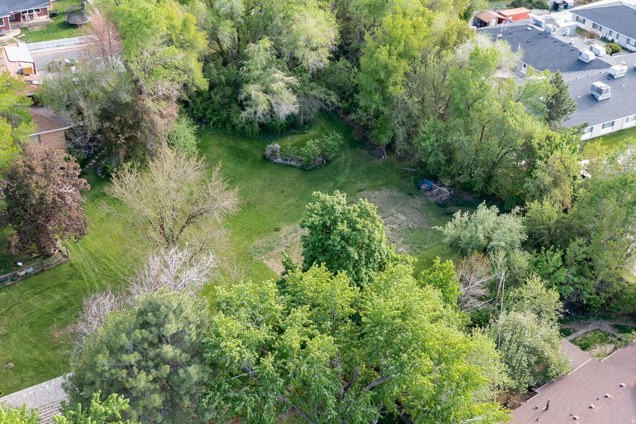 Rare opportunity on the east bench of Ogden, just minutes from Weber State University. The property owner is subdividing, offering a unique chance to create a custom lot (or two, or three) in a secluded, tucked-away setting within an established neighborhood. Mountain views and a setting that feels like an open space/ private park. Possible re-zone to commercial or multi-family. Please call agent for details on this property with so many possibilities in this exclusive location.