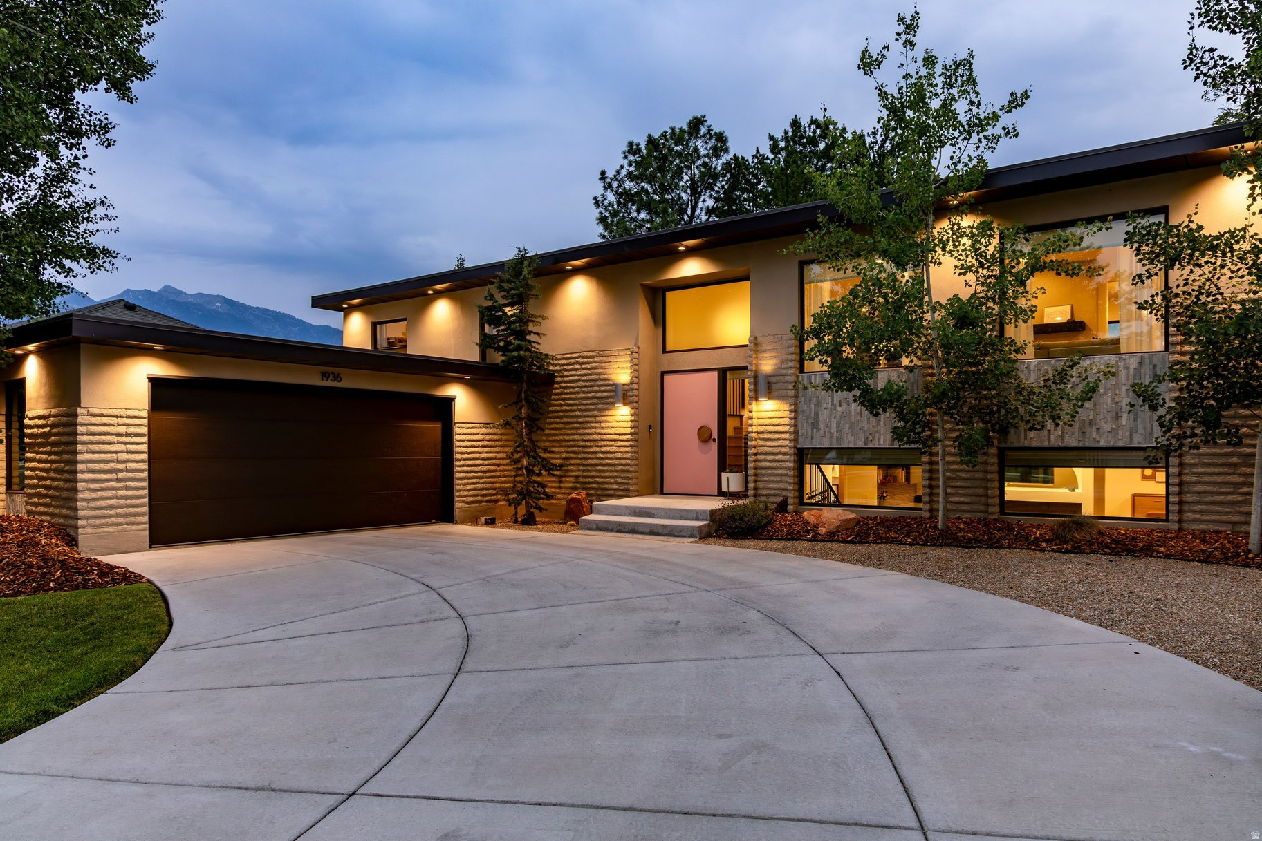 Perched to capture breathtaking 180-degree unobstructed valley views, this award-winning Parade of Homes residence is a masterclass in luxury, architecture, and timeless design. Thoughtfully renovated with uncompromising attention to detail, every space has been meticulously curated to create a seamless blend of sophistication and comfort.  The open-concept floor plan is anchored by a stunning chef's kitchen that flows effortlessly into the expansive living and dining areas, where a dramatic wall of sliding glass doors dissolves the boundary between indoors and out. Designed for exceptional entertaining and everyday living, the home embraces true indoor-outdoor living with seamless access to expansive outdoor spaces that showcase the spectacular panoramic vistas.  Immaculate designer finishes, custom craftsmanship, and refined materials are found throughout, creating an atmosphere of understated elegance. Every room has been intentionally designed to maximize natural light, functionality, and the home's extraordinary setting.  Perfectly positioned, the home offers the best of Utah living-just minutes from downtown Salt Lake City while providing quick access to world-renowned ski resorts in Big and Little Cottonwood Canyons. Whether enjoying an evening in the city, a day on the slopes, or simply taking in the spectacular sunsets from home, this residence delivers an unmatched combination of luxury, convenience, and lifestyle.  This is a rare opportunity to own a meticulously renovated, award-winning residence where architectural excellence, exceptional craftsmanship, panoramic views, and premier location come together in one extraordinary offering.