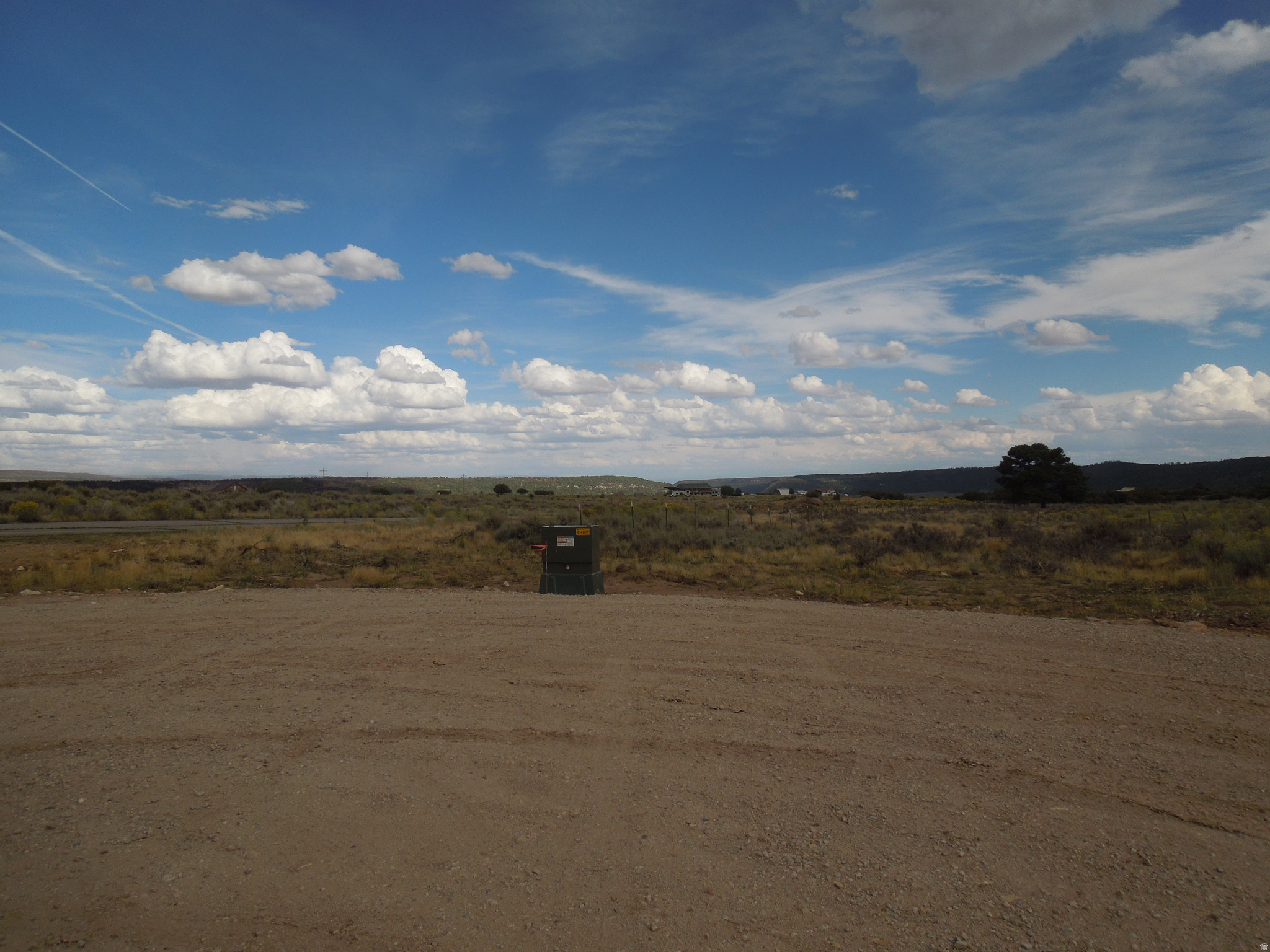 Lovely views of LaSal Mt. peaks and to the East San Juan Mts. in Colorado, and Pine Ridge to the South. Great recreational access for biking, hunting and 4 wheeling. You'll need to drill a well and install a septic system. Underground power transformer pedestal at frontage.  Seller financing terms require 15 % down payment, with balance carried at 6 % interest for a period of up to 15 years.  Sellers will impose a prepayment penalty of 10 % to be in effect for a term of 5 years for any amount paid over the amortized monthly payment. Seller is related to listing agent.