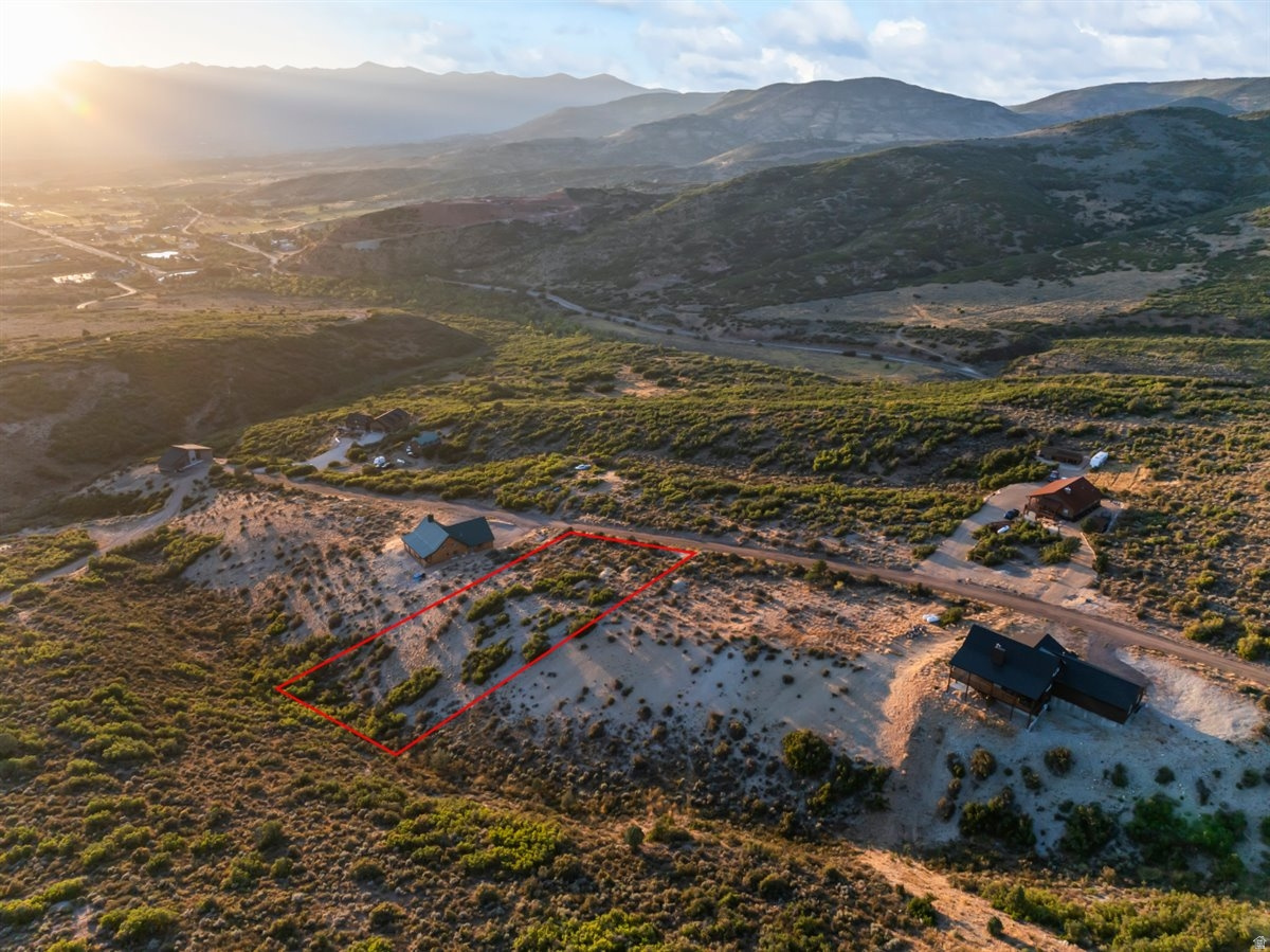 Discover this stunning 1.1-acre building lot at 7406 E Oakview Dr in Heber, Utah, where all the hard work is already complete and ready for immediate construction! This elevated parcel boasts amazing panoramic views of the Wasatch Back and surrounding mountains, with a topography that perfectly supports a full daylight basement for maximum living space and natural light. Perc test passed, Letter of Feasibility secured, approved septic design, topo survey, and full building plans are all in hand-saving you time, money, and headaches. Nestled in a serene mountain community with year-round access, enjoy peaceful seclusion while being just minutes from Heber Valley's amenities, world-class recreation, hiking, skiing, and Park City. Bring your builder (or we have trusted recommendations) and start building your dream custom home today in one of Utah's most desirable areas!