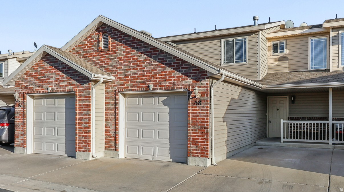 Nestled on a Quiet Street, this Beautifully Maintained Townhome has a Welcoming Neighborhood Atmosphere * This 3 Bedroom, 1 1/2 Bath, and 1 Car Garage unit has the following Updates:  * Freshly Painted Interior * White Kitchen Cabinets * White Stairway Handrails * New Vanity in Upstairs Bathroom * New LVP flooring on Main Level, Upstairs Hallway and Bathrooms * New Quality Carpet in all 3 Bedrooms & Stairs * Oversized Family Room with Access to a Private/Gated Patio * Covered Front Porch * The Back Opens Up to a Common Area that Beautifies the Area and Creates a Park-like Setting * Best Value in Clinton for a 3 Bedroom Home! *