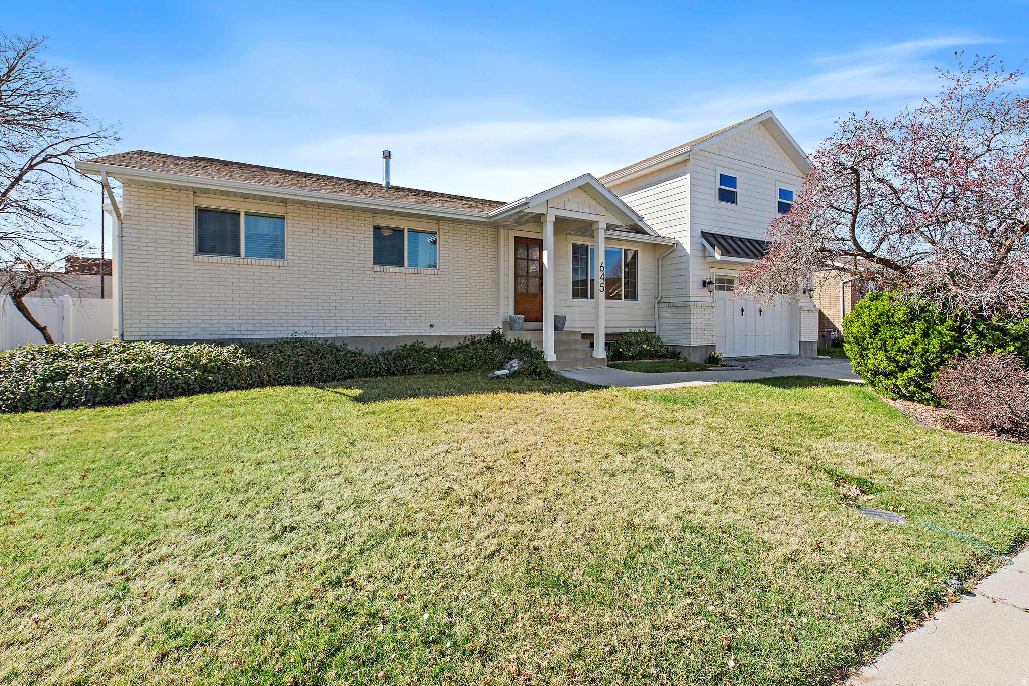 REMODELED & UPGRADED HOME with ADU POTENTIAL in a PRIME OREM LOCATION)*  Convenient location just minutes from Timpanogos Regional Hospital with quick freeway access.  OPEN FLOOR PLAN with functional living space with a layout designed for flexibility. The expanded and updated kitchen opens to a large dining and living area, creating a natural gathering space for everyday living and entertaining. Updates throughout include new flooring, fresh paint, and modern finishes, giving the home a clean, move-in ready feel. The lower level features an over 700 sq ft accessory apartment setup, already in place and just needing minor finishes to meet Orem City ADU approval, ideal for rental income, house hacking, or multi-generational living.  MAIN FLOOR LIVING includes spacious primary suite, additional bedrooms, and a large open kitchen/family area. You'll also find approximately 500 sq ft of unfinished space above the garage, offering future expansion, storage, or the potential for additional living space. With multiple living areas, a large garage, and generous storage (including attic space), this home delivers a rare combination of space, updates, and income potential.  Opportunities like this, with built-in flexibility and upside are hard to find in this location.