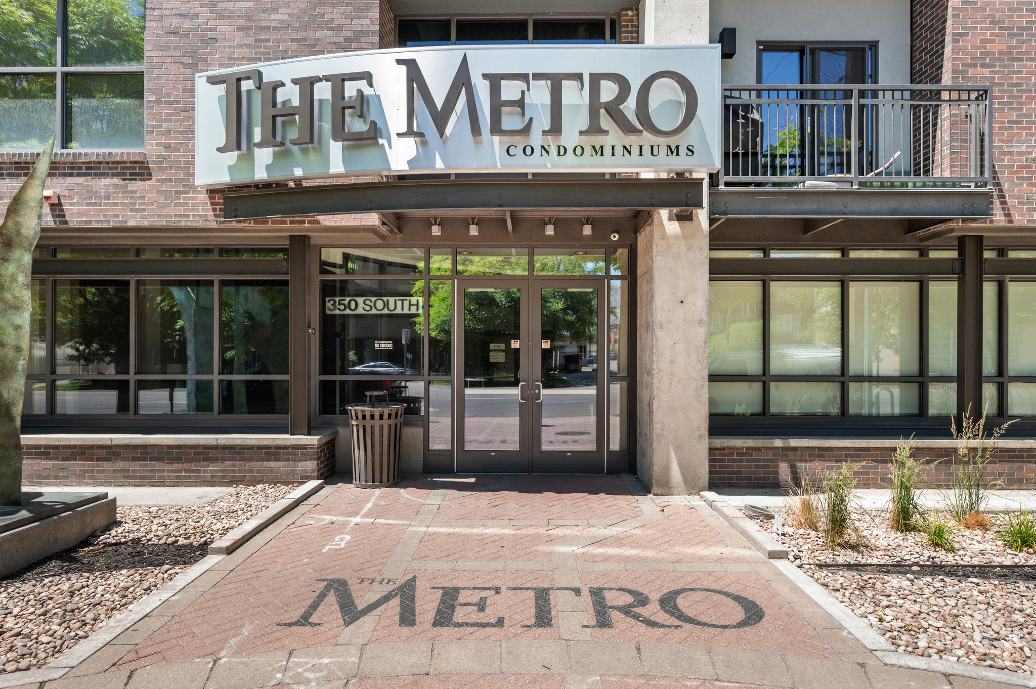 Life elevated begins at the Metro.  Positioned on the preferred east side of downtown, the city unfolds around you.  The Metro offers something increasingly rare in Salt Lake City: the freedom to live spontaneously.  Step outside and enjoy impromptu dinners, concerts, sporting events, TRAX access, a private fenced dog run, and convenient proximity to many of Utah's largest employers.  Inside, residents enjoy secure building access, 9 foot ceilings, hardwood floors, private owner storage, and two dedicated parking spaces (#454 on Parking Level 2 // #507 on Parking Level 3).  Unit 405 is prepared, polished, and ready for immediate occupancy.  Factory-fresh kitchen appliances, plantation shutters, new windows, and designer-grade carpet complete the space.  Schedule your private showing today and discover a lifestyle the suburbs simply can't replicate.