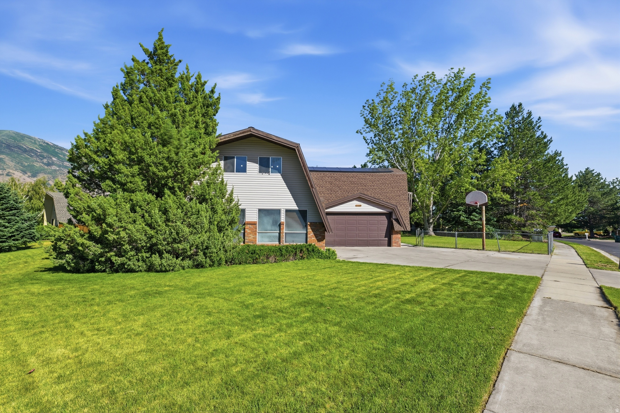 Investors beware...  of competition!   This one's a no brainer if you have the capital. Rare 3,825 sqft in Highland Utah on this much good land at $150/sqft is NUTS -especially considering the walk-out basement ADU is already finished and ready to rent or live in while you work the upstairs!  ARV = $800k-$900k, depending on level of remodel.  Seller just didn't want headache of construction.    Paid-off solar panels, fully functional automatic sprinkler system,  porch, big storage shed, cabinesque vibes with big windows, massive open living spaces, sauna room or extra bathroom upstairs, recently remodeled and updated downstairs ADU with wide walkout basement.   Got bids to fully revamp the main floor and upstairs (basement is already new and ready to go as a legal ADU/mother in law) into midcentury modern VRBO/AirBnb.  Bids came in between $100k-$130k. Flip it and make a quick $150k, or BRRR and keep it as a cool AirBnb!  Just do it quick before I find the capital to do it! ;).    The home is is being sold "as is" and no repairs will be made.  This is an estate sale-  No Property Condition Disclosures will be provided by seller. Buyer is advised to do full due diligence including inspection, city use options, etc.   Square footage figures are provided as courtesy estimates only and were obtained from county records. Buyer is advised to obtain an independent measurement and check with local city and state requirements for construction, zoning regulations, etc.