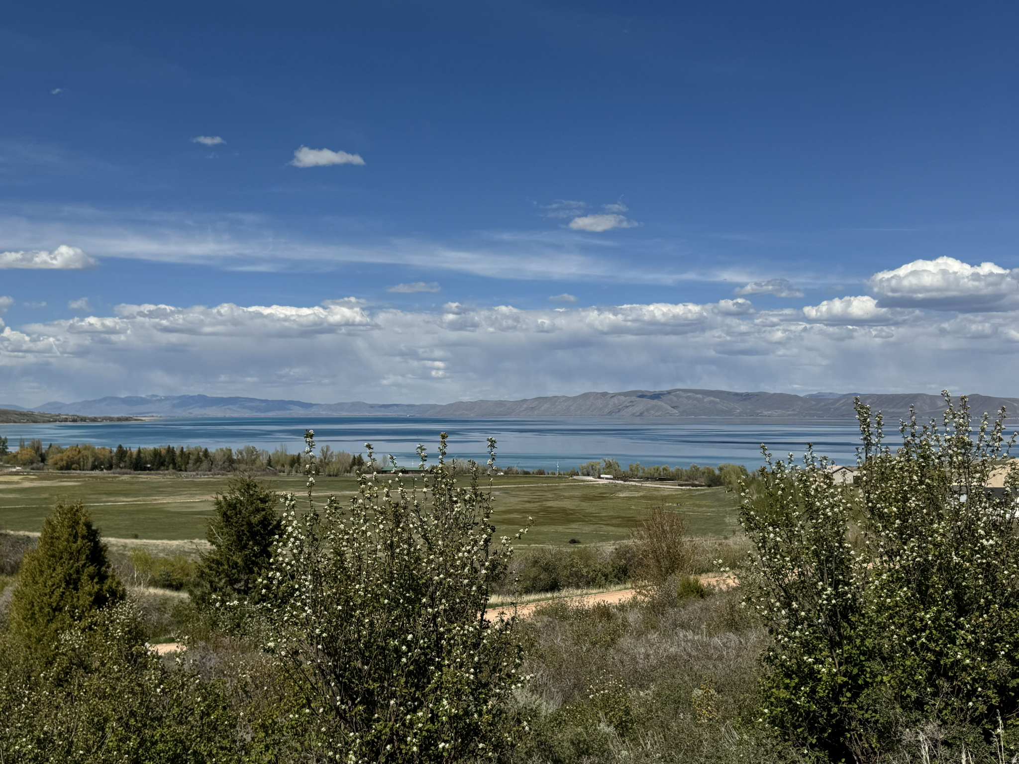 Unobstructed views that will never be blocked set this Swan Creek Village lot apart from the rest. Build with confidence knowing your sightlines are protected and your Bear Lake views are here to stay. No nightly rentals here and that's exactly the point. Swan Creek Village is designed for owners who want fewer suitcases rolling by and more time actually enjoying Bear Lake. The result? A quieter, more neighborly atmosphere where weekends feel like vacations again. Buyer to verify all information.