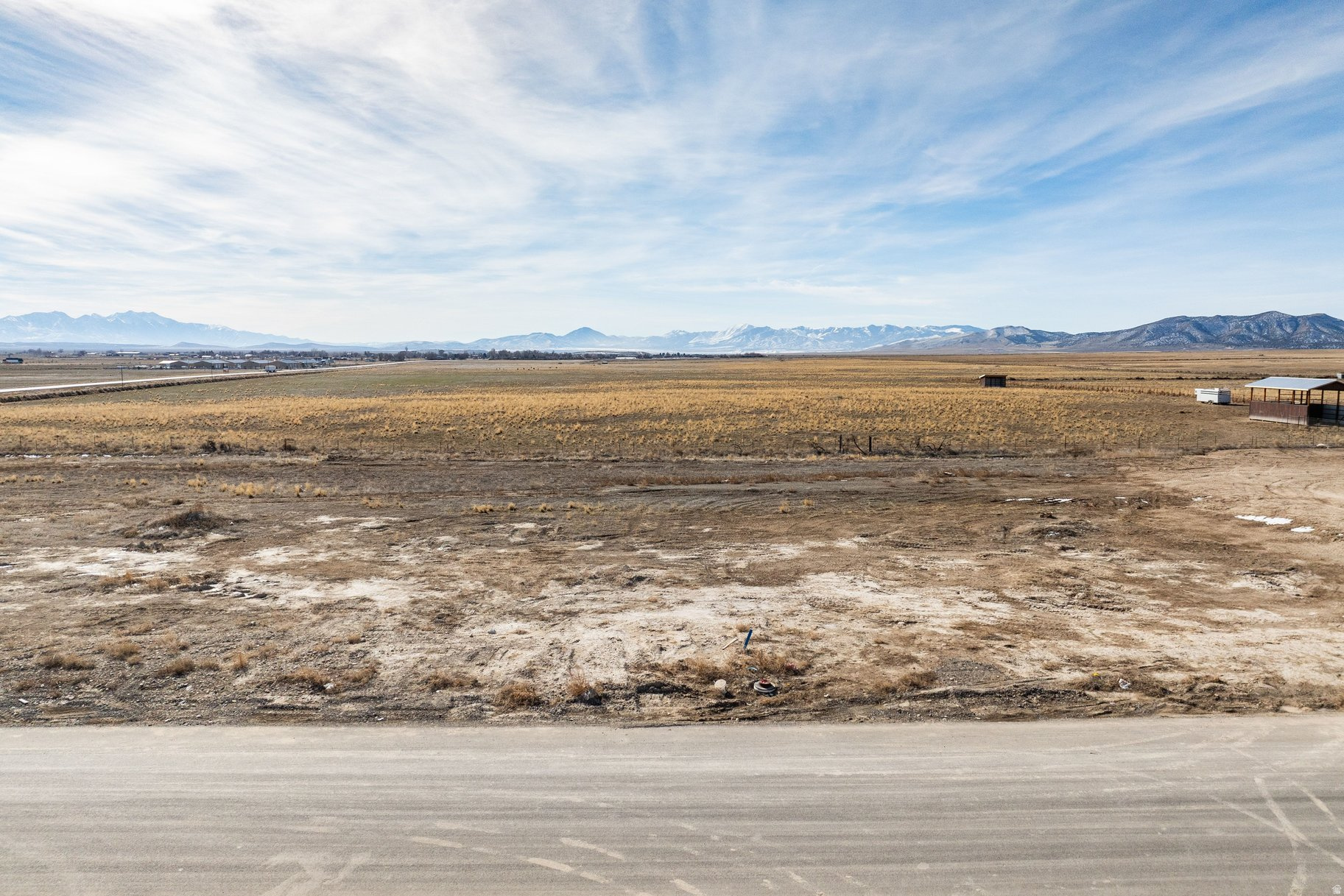 Rare opportunity to own a fully buildable one acre horse property in Eagle Mountain with exceptional flexibility for both animals and home design. This lot is zoned to allow up to four horses with the required 2,500 square feet of fenced area per horse, up to four cattle, and no limit on chickens, creating a true rural lifestyle opportunity while still being within a growing community.  The property offers generous building freedom with a minimum home size requirement of only 1,000 square feet excluding garage space and no maximum square footage limit, allowing you to design anything from a modest residence to a large custom estate as long as it fits within standard setbacks. This level of flexibility is increasingly difficult to find in Utah County and provides long term value for future expansion or customization.  Whether you are looking to build a private homestead, equestrian property, hobby farm, or custom home with space to spread out, this Eagle Mountain acreage offers the ideal foundation. Enjoy open skies, mountain views, and the freedom that comes with animal rights and usable land while still being within reasonable distance to schools, shopping, and commuter routes.  A rare combination of location, acreage, and building potential makes this property an exceptional opportunity for buyers seeking land with true versatility in Utah County. Buyer and Buyer Broker to verify all information.