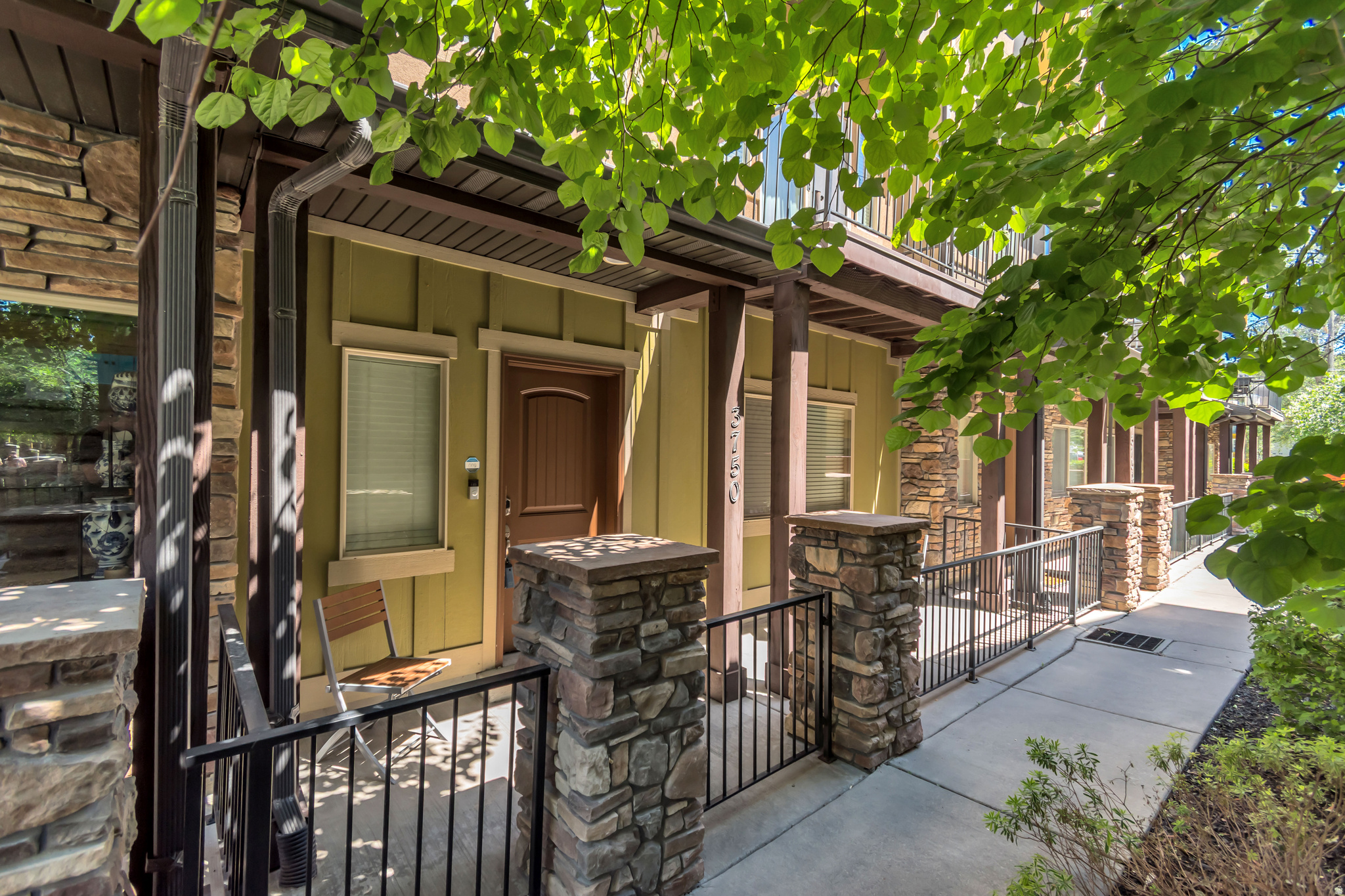 Enjoy affordable, low-maintenance living in this spacious townhome located in the heart of the valley! Conveniently walk to the TRAX station via a private neighborhood pathway, explore the diverse dining options surrounding Chinatown Plaza, and take advantage of quick and easy freeway access. Offering the perfect balance of urban convenience and value, this home provides unparalleled access to cultural attractions, walkable amenities, and exceptional dining while avoiding the higher cost of living and limited square footage often associated with downtown living. Ideal for professionals, executives, and students, it supports an active lifestyle with significantly reduced commute times. The spacious primary suite features a relaxing garden tub, separate walk-in shower, double vanity, and large walk-in closet. Additional bedrooms offer generous space and ample storage. The open-concept kitchen, dining, and living areas create an inviting environment for entertaining, and you'll appreciate the HUGE pantry for all your storage needs. The HOA provides exceptional convenience by covering yard maintenance, snow removal, insurance, water, sewer, and garbage services, making homeownership truly low maintenance. Move-in ready and designed for comfortable, carefree living, this home is an outstanding opportunity for anyone seeking convenience, space, and value in a central location.