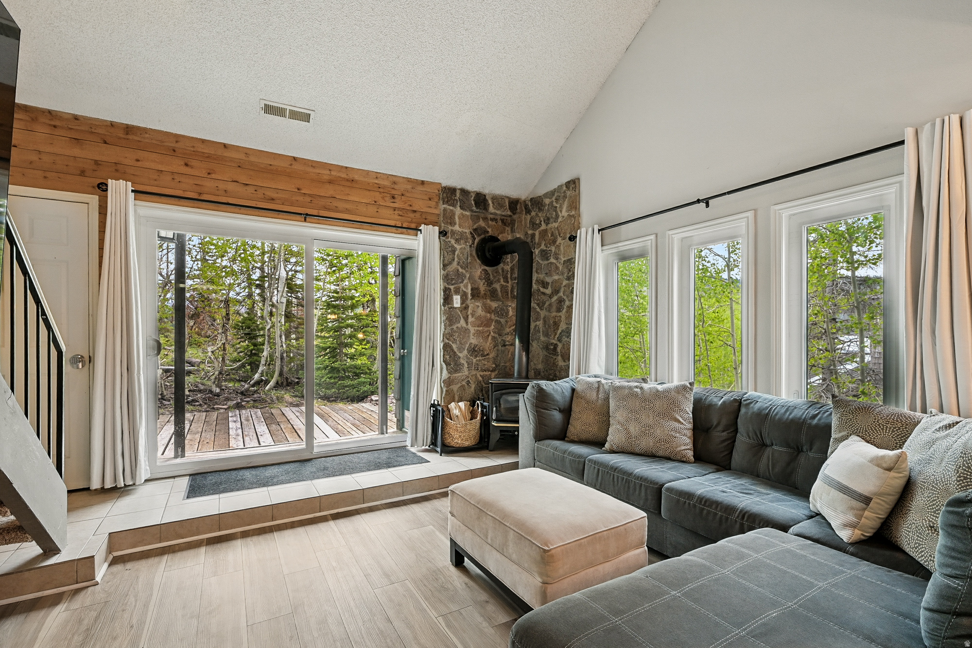 Escape to the mountains in this beautifully updated 2-bedroom, 1.5-bath corner condo offering comfort, convenience, and year-round adventure. Large windows fill the space with natural light, while energy-efficient upgrades and smart Wi-Fi thermostats provide modern efficiency and remote climate control. Enjoy a private entrance, tranquil mountain surroundings, and refreshing summer temperatures. Located close to skiing, hiking, biking, and outdoor recreation, this versatile property is ideal as a primary home, vacation retreat, or income-producing nightly rental.