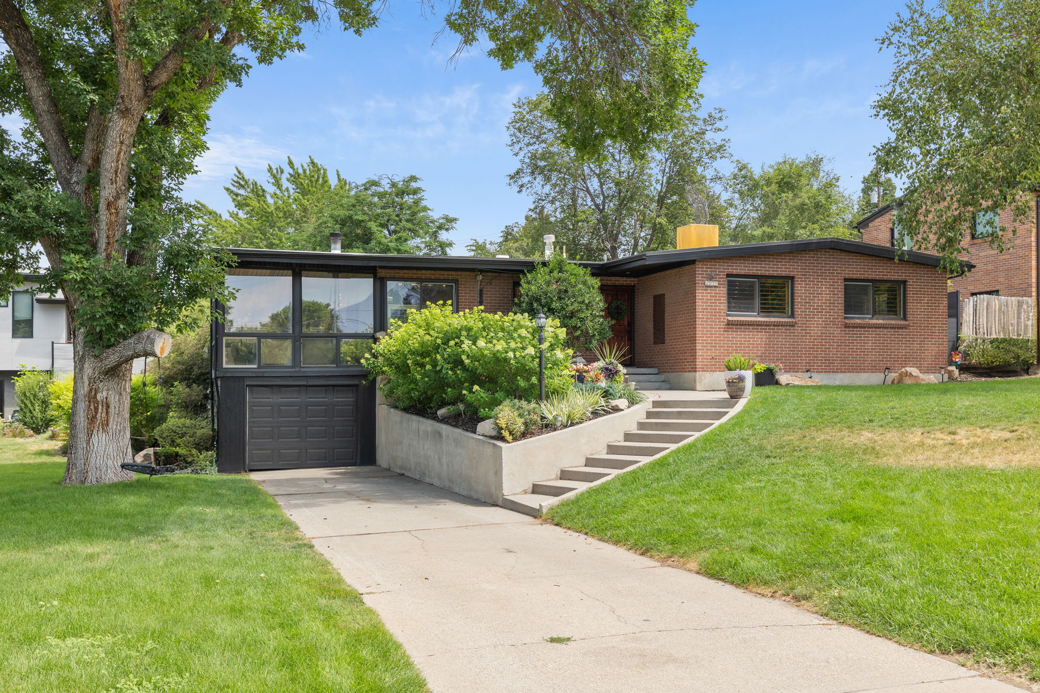 Welcome home to this immaculate, move-in-ready gem nestled in one of Holladay's most delightful and sought after neighborhoods. From the moment you arrive, you will be captivated by the incredible views of Mt. Olympus, visible from both the beautifully landscaped front yard and your private backyard. Inside is a a spacious, light filled layout featuring 4 bedrooms and 2 bathrooms, perfectly designed for both daily living and seamless entertaining. Spend your summers lounging by the pristine swimming pool, featuring brand new, top tier pool equipment for ultimate peace of mind and low maintenance enjoyment. Whether you are enjoying a morning coffee against the backdrop of the Wasatch peaks or hosting a summer poolside barbecue, this property delivers the ideal Utah lifestyle. Incredible location with quick access to world class canyons, top rated schools, and Holladay's vibrant local dining and shopping. Truly turnkey and ready for its next chapter! Figures are provided as a courtesy, buyer and buyers agent to verify all information.