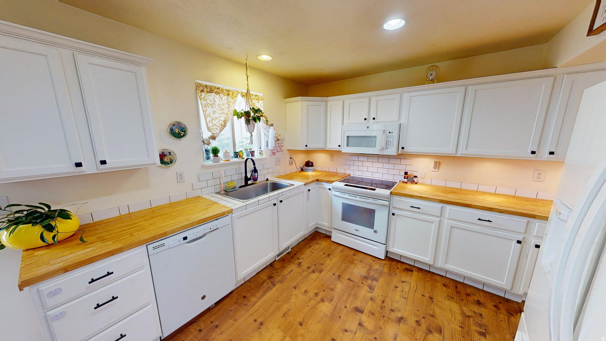 This generous 5-bedroom, 3.5-bathroom residence offers a highly functional multi-level layout. Backed by top-tier community perks and major system overhauls completed between 2023 and 2026, this property represents an incredible turnkey value in the Tooele Valley. *Premium Mechanical & Detail Upgrades* Skip the unexpected expenses of older homes. The core infrastructure of this property has been extensively modernized: Central Air Conditioning: Brand-new unit installed in 2026 for peak summer efficiency. High-Efficiency Furnace: Replaced in 2025 for optimized climate control and lower winter utility bills. Water Heater: Upgraded in 2023 ensuring reliable, long-term performance. Daily Conveniences: The updated kitchen features butcher block countertops, an upgraded dishwasher equipped with a premium 3rd rack for maximized cleaning capacity, while the primary bedroom suite boasts a luxury ceiling fan operated via a convenient wireless remote control. *HOA Amenities & Freedom* Located within the desirable Crescent Court community, the low-maintenance lifestyle allows you to reclaim your weekends:  Clubhouse & Fitness: Exclusive resident access to a fully equipped community clubhouse and on-site fitness facilities.  Community Pool: Enjoy hot Utah summers lounging by the neighborhood swimming pool.  Full Landscape Maintenance: The HOA completely covers lawn and exterior landscape care, ensuring pristine curb appeal year-round without any yard work on your part. *Exceptional Proximity & Tooele Lifestyle Data* Commuter Hub: Positioned just minutes from Highway 36 (Main Street), providing a seamless 35-minute commute to the Salt Lake International Airport and downtown Salt Lake City business districts. Education Corridors: Located within walking and short-driving distance of local schools, including Copper Canyon Elementary (0.9 miles), Clarke N. Johnsen Junior High (1.0 mile), and Tooele High School (1.7 miles).  Retail & Dining: Centrally located just moments away from regional medical facilities, major grocery hubs, cinema entertainment, and local dining favorites.
