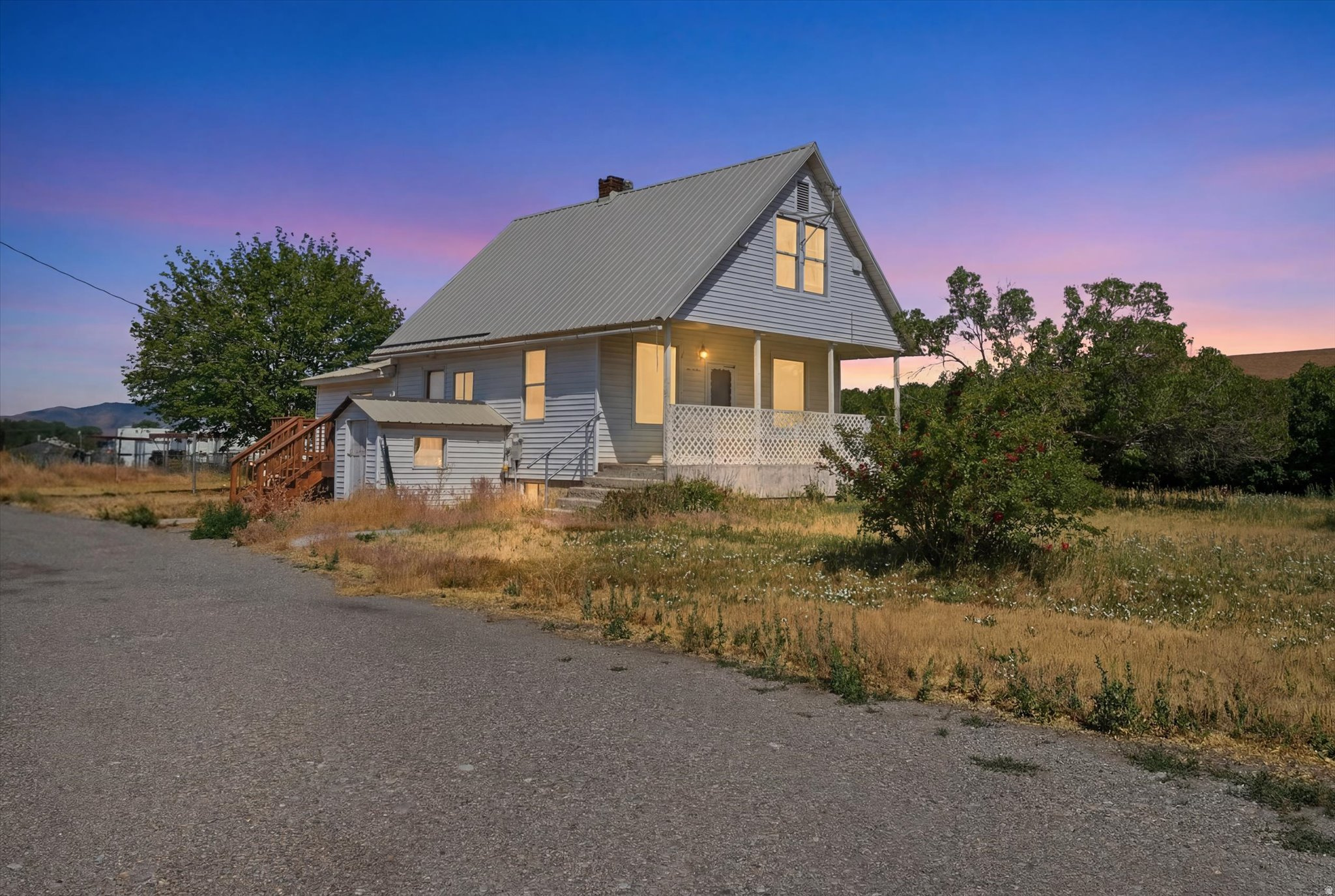 This home has been thoughtfully updated from top to bottom, giving you the character of a classic property with the peace of mind of modern systems. Recent improvements include fully modernized, grounded electrical wiring throughout, a complete bathroom remodel, and a renovated upstairs bedroom and room. The front room now features a relocated staircase entry (no more walking through the bathroom to get upstairs), plus added door railing for safety upstairs. Outside, enjoy a brand new deck, perfect for relaxing or entertaining. Behind the scenes, this home has been set up for the future with added Ethernet and low-voltage network wiring, while major systems have been replaced or upgraded: a new furnace, a replaced water main, and a thermal expansion tank added to the water heater. The stairs have been reinforced for safety, and dryer ventilation has been added for improved efficiency and safety. This is a home where the major investments have already been made, so you can move in and enjoy peace of mind from day one.