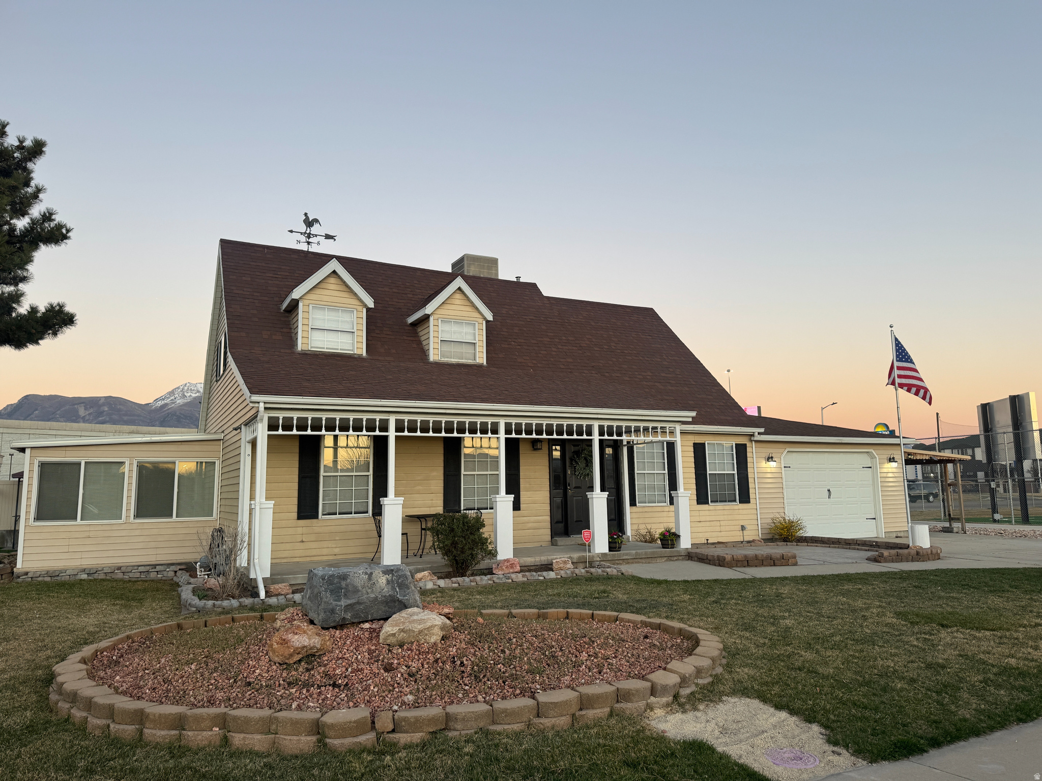 MUST SEE!! This house is in the heart of Lehi! Views of the mountains and the Lehi Roller Mills make you feel at home. This Cape Cod style home is full of charm and comfort! The bright, inviting living spaces create a warm, cottage-style feel throughout the home. The open yard offers plenty of space to relax, or entertain guests.  Conveniently located near Lehi's shops, dining, parks, and commuter routes, this home is perfect for anyone seeking a comfortable retreat in a prime location.  In addition to the home's charm, you'll appreciate the ample space for vehicles, ATVs, and recreational toys. The property also features a nicely sized tool shop and a separate powered workspace that could serve as a salon, studio, or small home business.  A unique opportunity with flexibility, function, and cozy appeal!  Recently updated HVAC.  Square footage figures are provided as a courtesy estimate only and were obtained from County Records.  Buyer is advised to obtain an independent measurement.