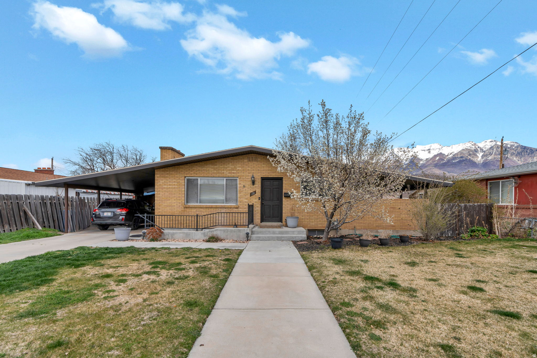 Versatile rambler with a fully separate basement living space nestled in a peaceful Orem neighborhood. The main level features 3 bedrooms and 1.5 bathrooms, with a living area that welcomes you with abundant natural light, a cozy fireplace, and built-in shelving and storage. The kitchen includes white cabinetry, a built-in dishwasher, and a dining area with easy flow into the living space. Downstairs, the basement offers 3 additional bedrooms and a full bathroom, along with a private entrance, full kitchen with dishwasher and breakfast bar, and a spacious living area with a second fireplace, well-suited for multigenerational living or added flexibility. Outside, enjoy a fully fenced backyard with a storage shed. Conveniently located just minutes from State Street with quick access to shopping, dining, and commuter routes. Measurements provided as a courtesy only, buyer to verify all info.