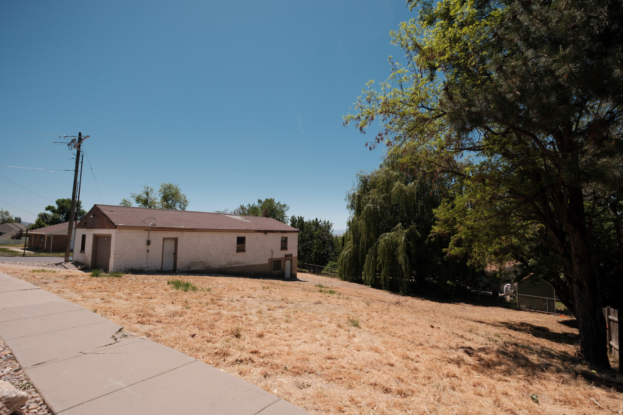 Rare find. Quarter acre lot in desirable Farmington neighborhood. Come build your dream home. Beautiful views, great school district, wonderful area. Lot has a garage on the property that can fit 4 cars, as well as some storage space in the back and underneath. Lot is approved for ADU. Secondary and culinary water, and electrical power is all there. There does not appear to be a gas meter.   Buyer to verify utilities availability with city.