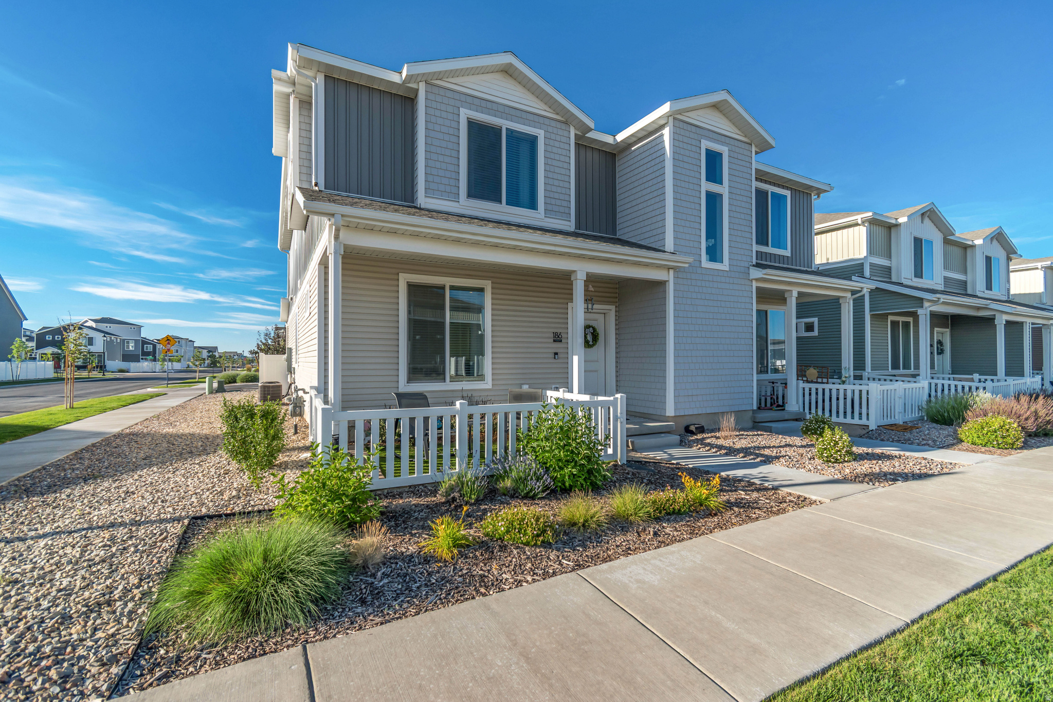 Welcome to Wander in Saratoga Springs! Discover the perfect blend of comfort, style, and community in this charming Plateau floor plan. Featuring  3 spacious bedrooms, 2.5 bathrooms, and a 2-car garage , this thoughtfully designed home offers an open-concept layout ideal for both everyday living and entertaining.  The heart of the home is the beautifully appointed kitchen, complete with a  large eat-in island, abundant counter space, and seamless flow into the bright and airy Great Room. Expansive windows fill the home with natural light, creating a warm and inviting atmosphere throughout.  Enjoy the added charm of a private front yard space with a classic picket fence, perfect for relaxing outdoors, visiting with neighbors, or creating your own personal retreat.  Located within the highly sought-after Wander community, residents enjoy access to exceptional amenities, including natural hot springs, a resort-style pool, clubhouse, parks, playgrounds, miles of walking trails, and convenient proximity to schools, shopping, dining, the city library, and civic center.  Special builder incentives and preferred lender financing programs may be available. Don't miss your opportunity to own a brand-new home in one of Saratoga Springs' most exciting communities! Schedule your tour today.