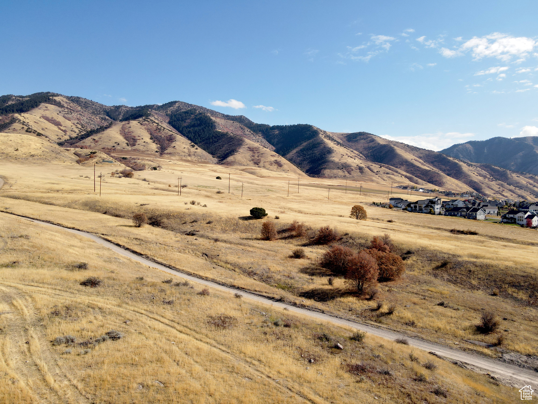 Come check out Lone Cedar, a new community in Hyde Park, offering stunning westward valley views and majestic eastward mountain scenery toward Hyde Park Canyon. These view lots provide plenty of flat space up front to build your dream home while offering unobscured views out the back. Designed to foster an attractive community, Lone Cedar ensures ample space between lots and prioritizes water conservation with native, drought-tolerant landscaping. Future buyer will be required to use Top Notch Construction to build the home.